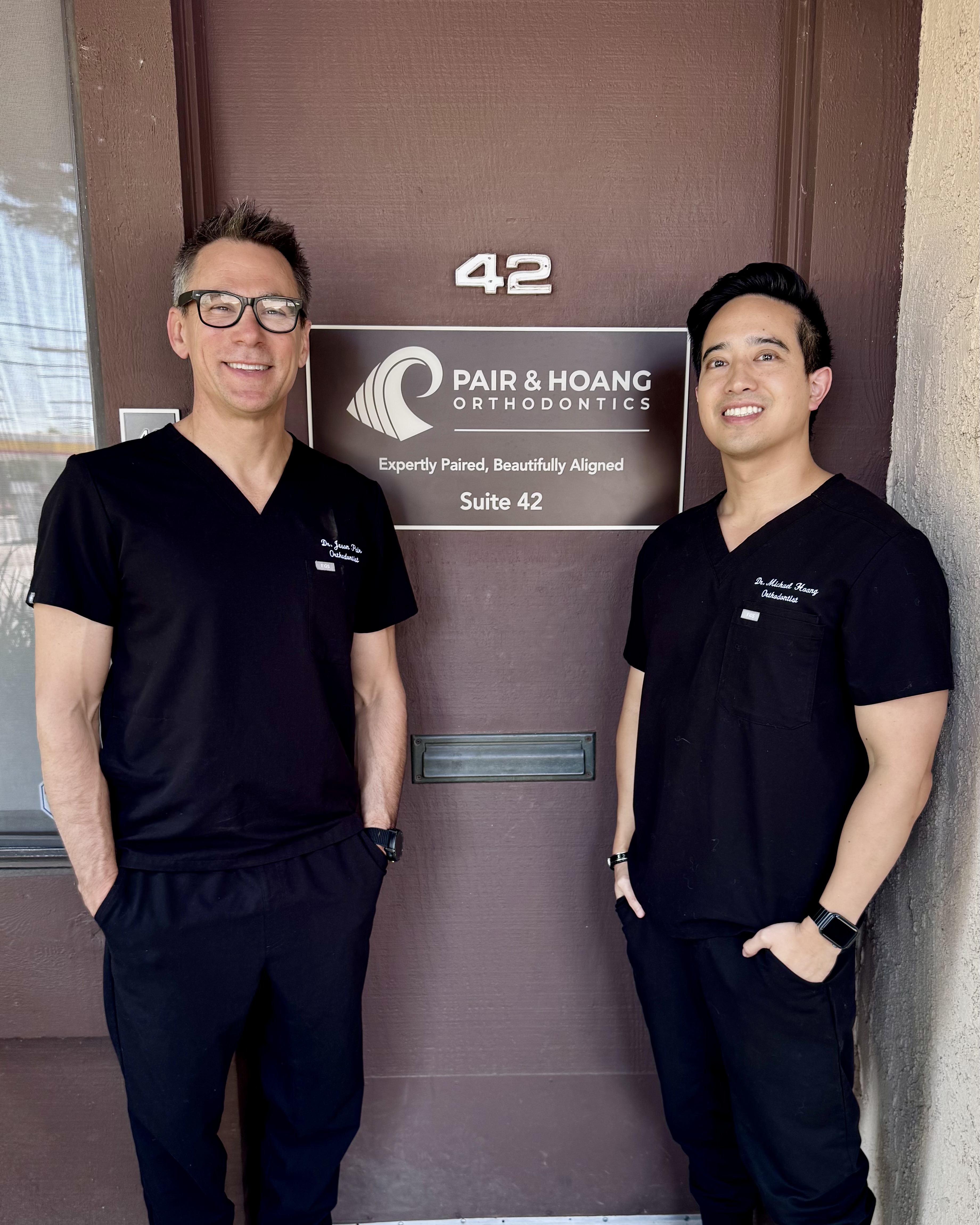 Dr. Jason Pair and Dr. Michael Hoang outside the Pair & Hoang Orthodontics Northridge office, Suite 42