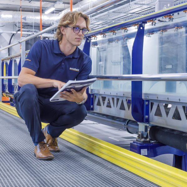 Engineer working on a production line training system