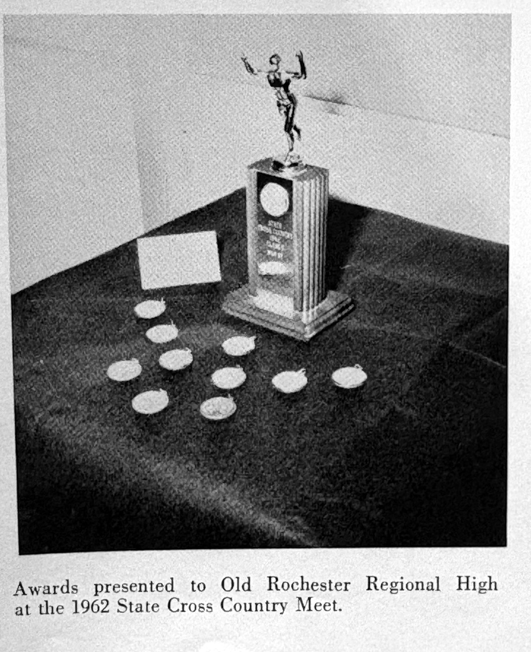 1962 Class E state championship trophy and medals from the ORR yearbook
