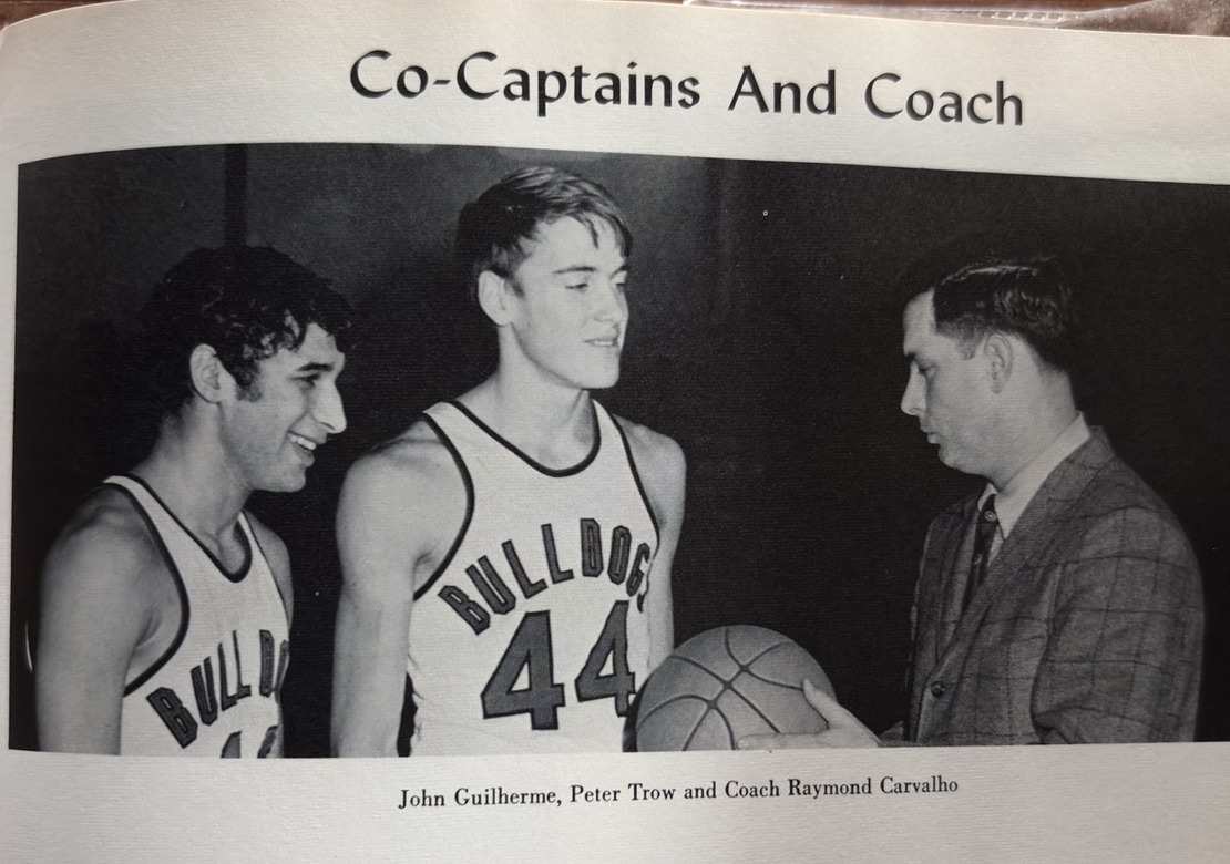 Basketball co-captains John Guilherme and Peter Trow with Coach Raymond Carvalho