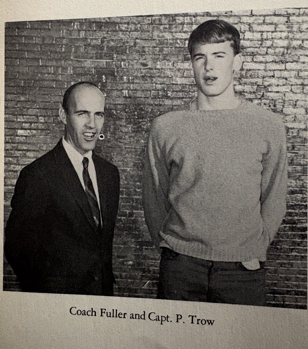 Coach Fuller standing beside ORR track captain Peter Trow