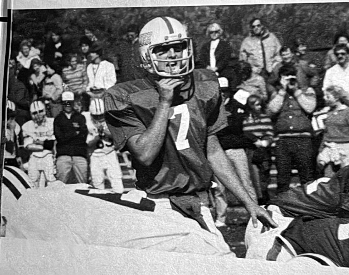 Christopher Riley, number 7, playing quarterback for Old Rochester Regional