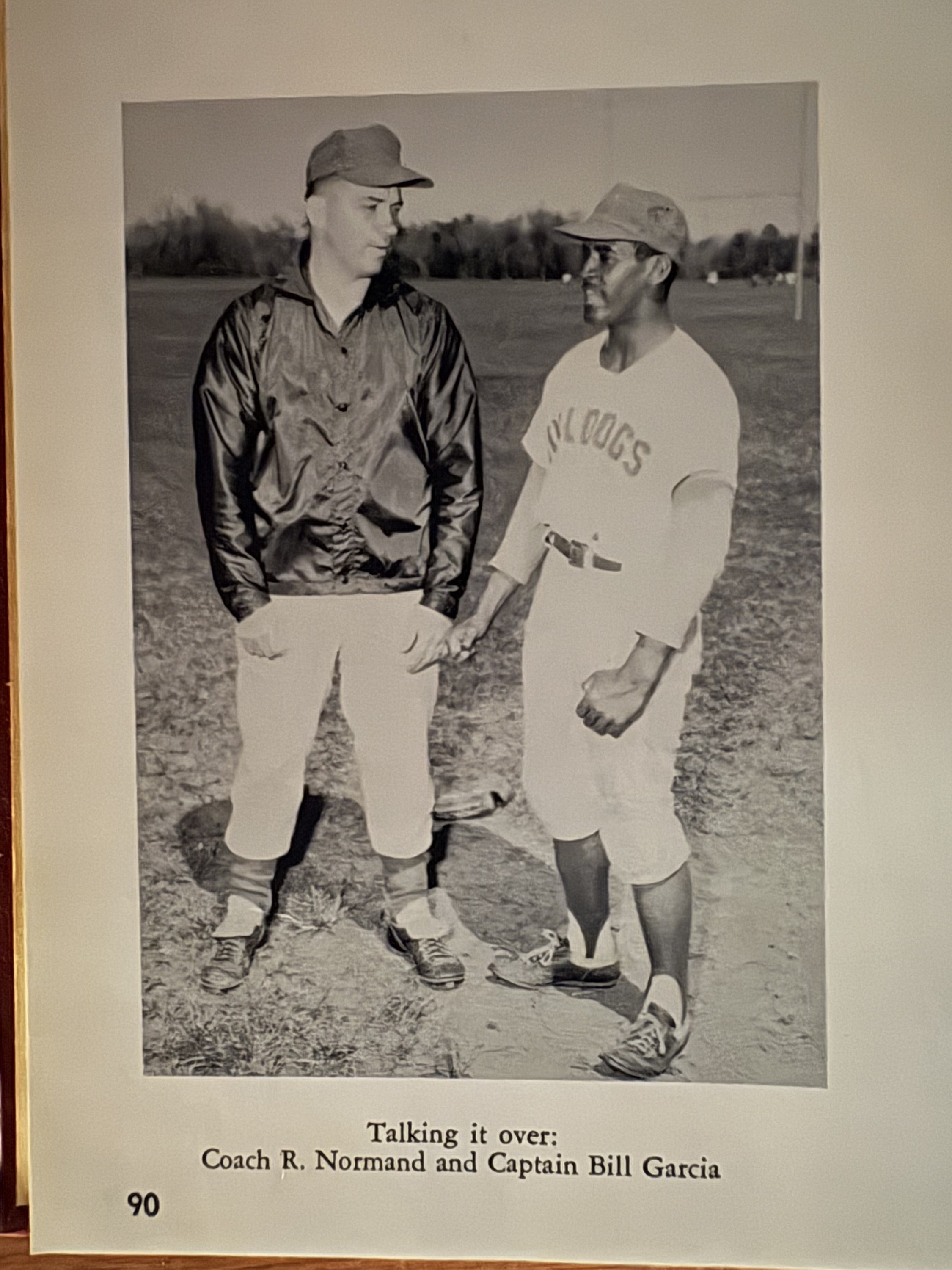 Coach R. Normand and Captain Bill Garcia together on the baseball field in an ORR yearbook photograph