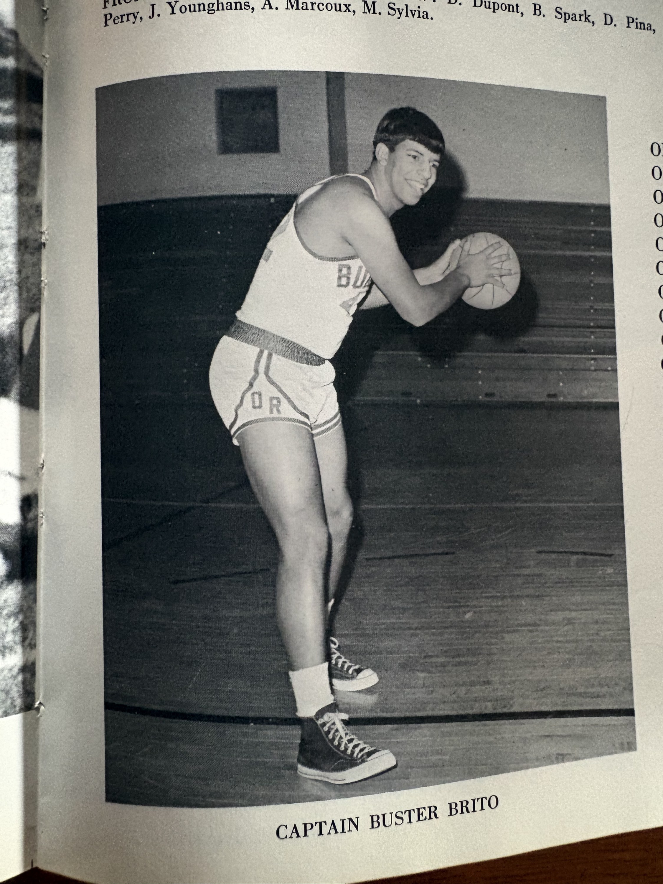 Yearbook photograph captioned Captain Buster Brito
