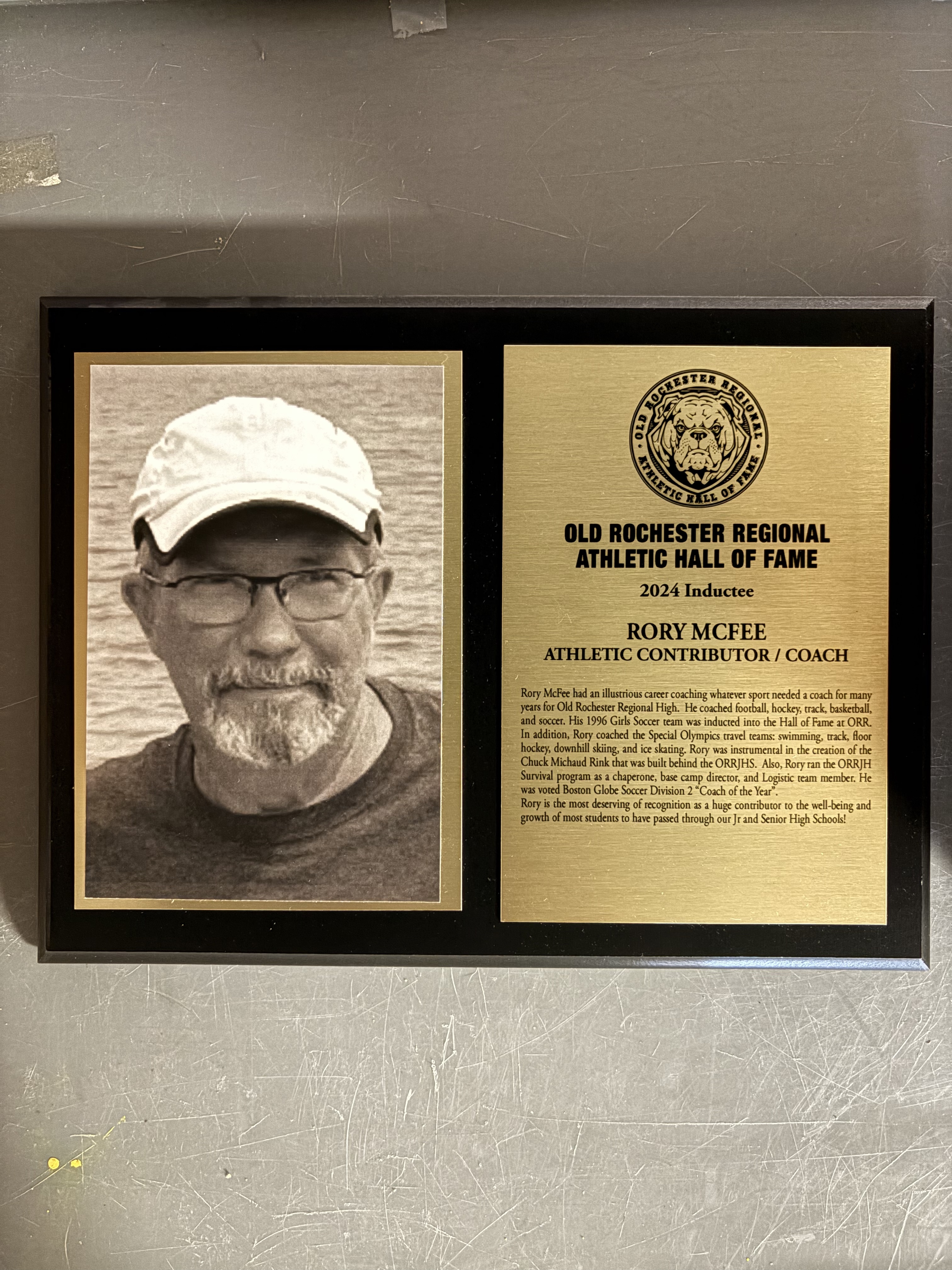 Rory McFee’s complete 2024 Hall of Fame display with historical photograph and induction plaque