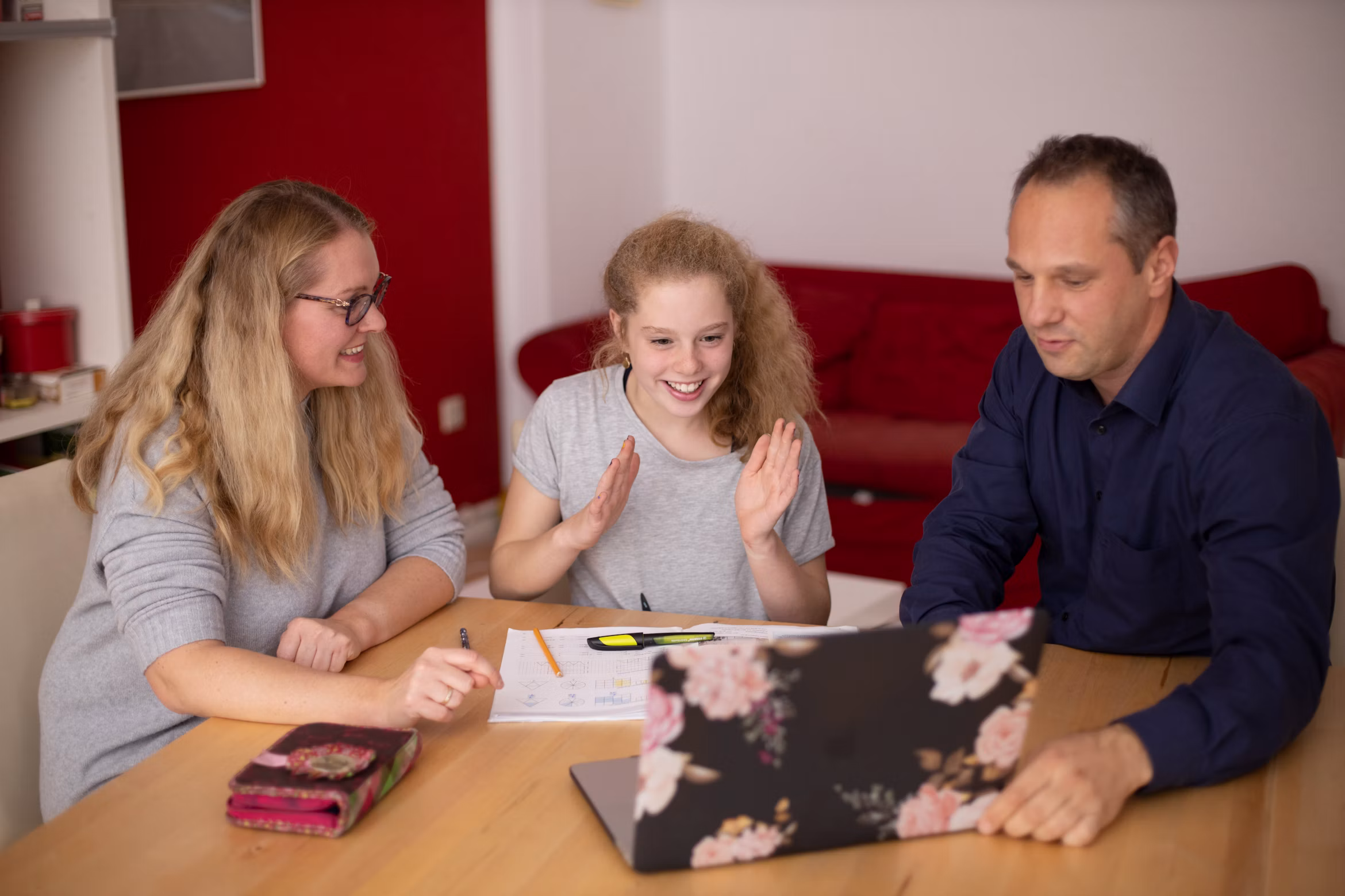 Educational advocate reviewing school records with a family