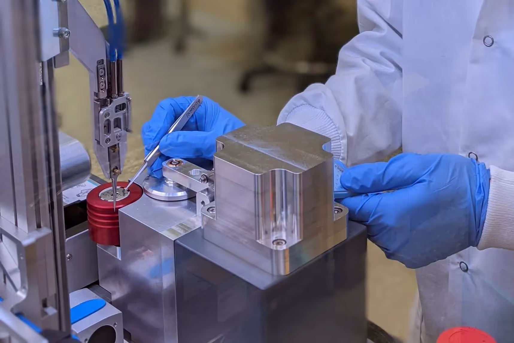 Researcher preparing a cryo-EM grid with a Vitrobot during sample vitrification