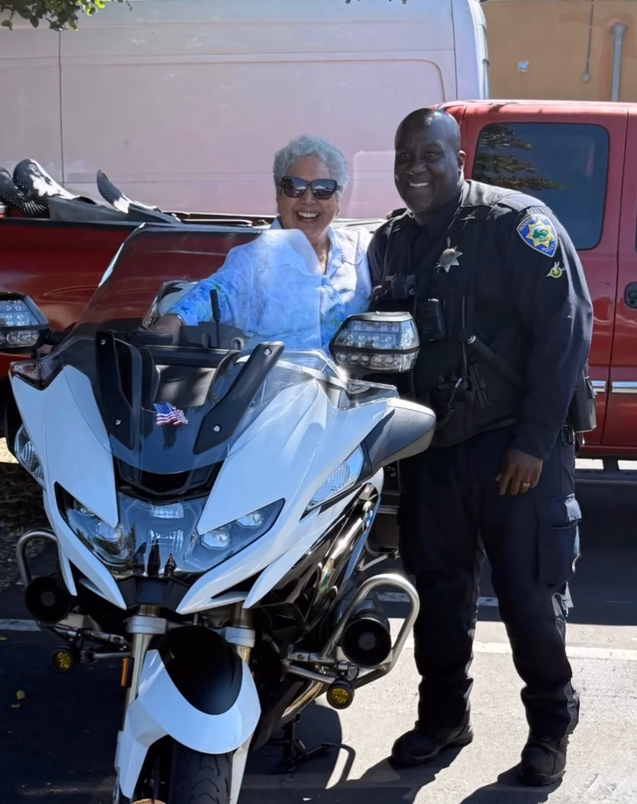 Mountain View police sergeant standing beside a patrol vehicle