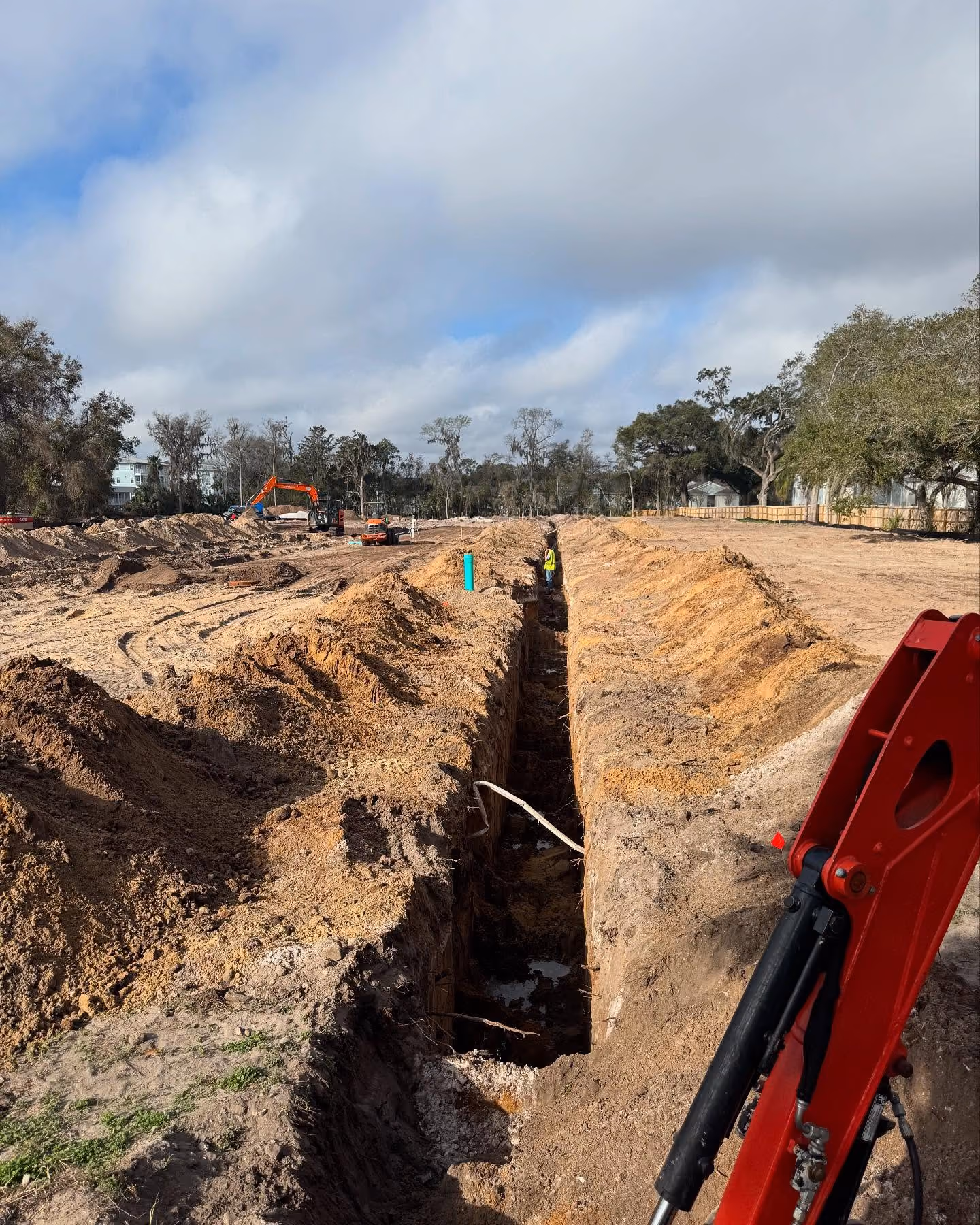 Commercial construction site trenching for underground electrical service.