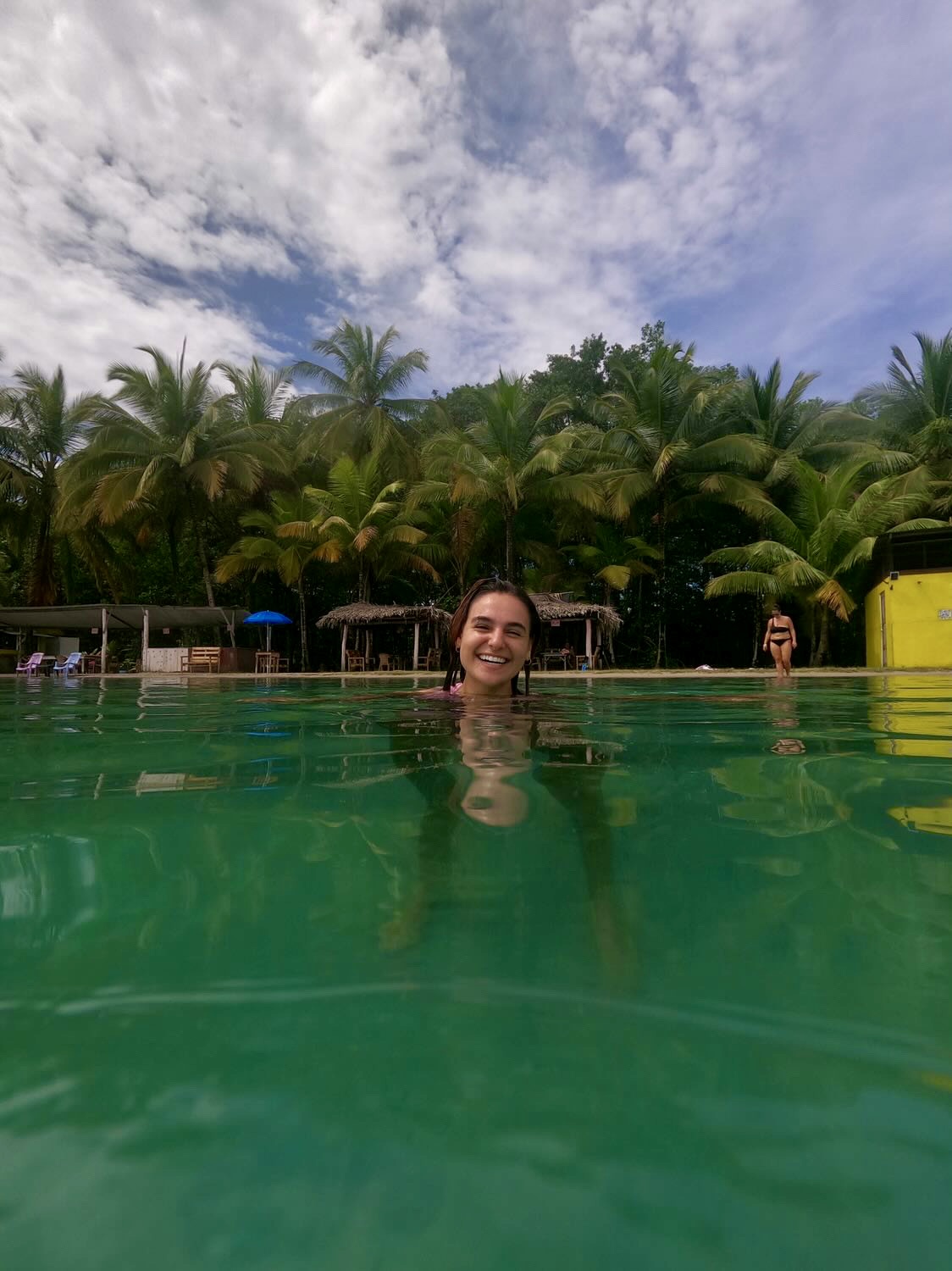 Swimming in a palm-fringed turquoise lagoon