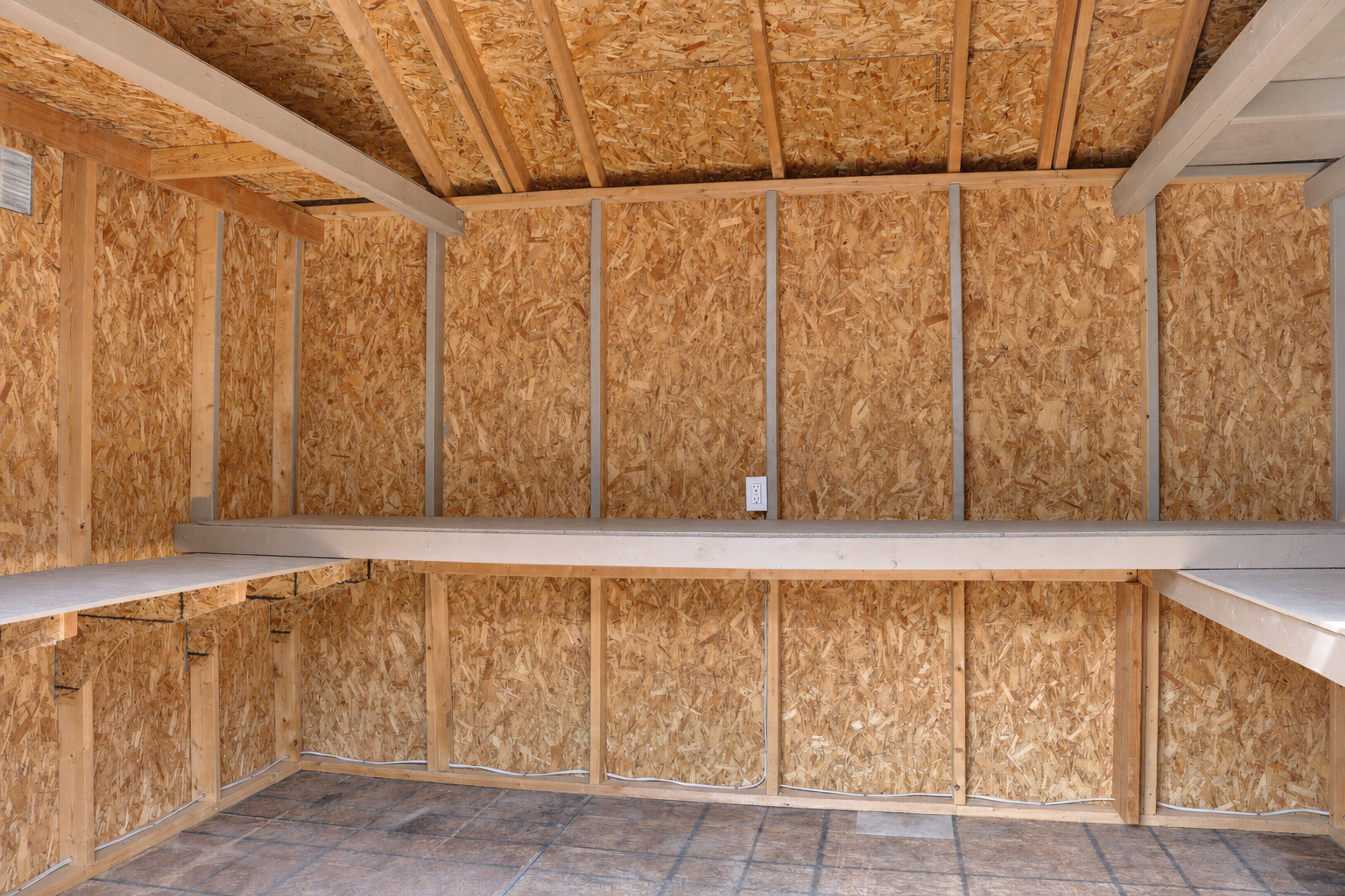 Interior of the backyard workshop with shelving and work counter, Anaheim rental