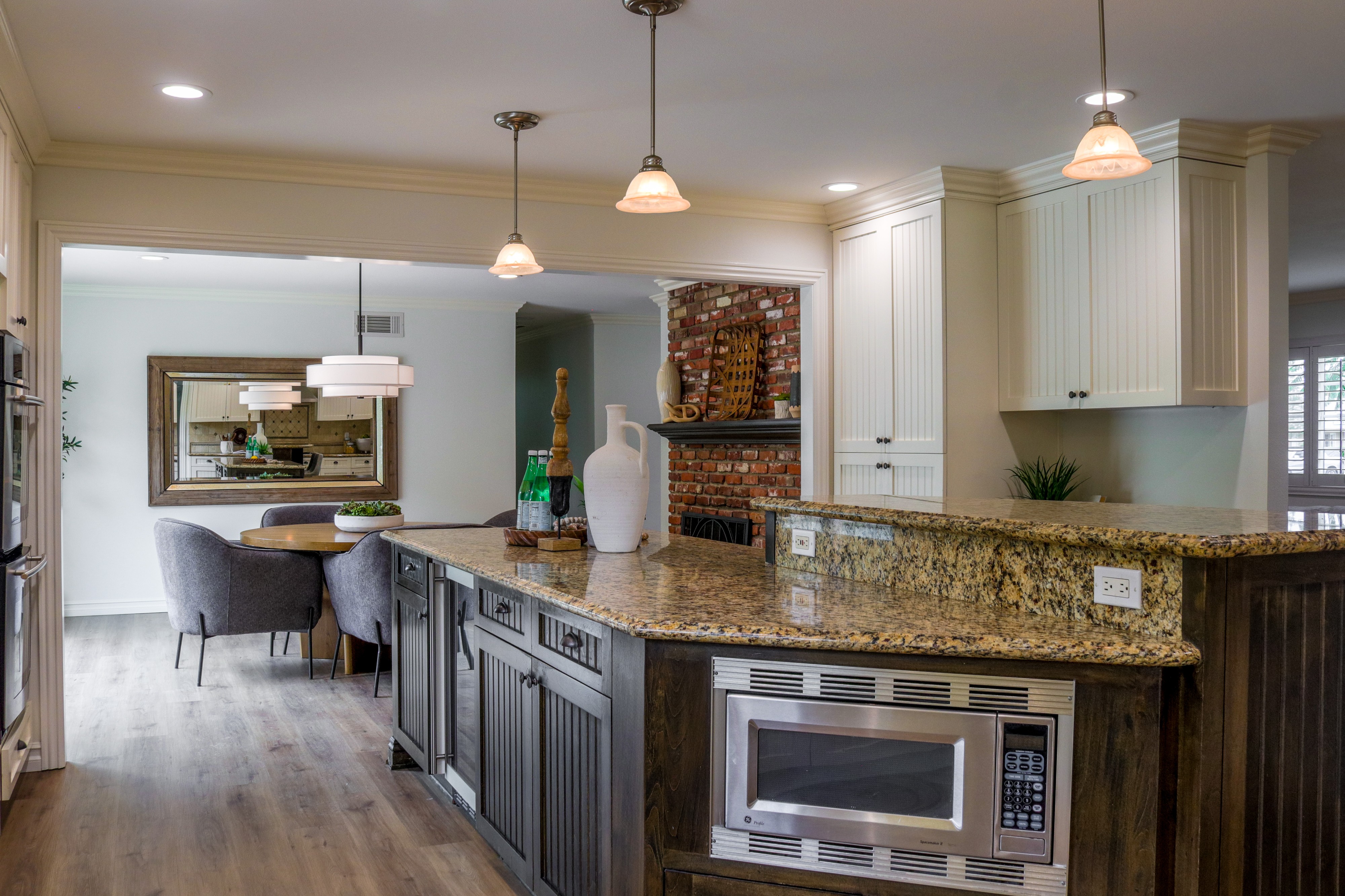 Remodeled kitchen with granite island and pendant lights, Tustin home for sale
