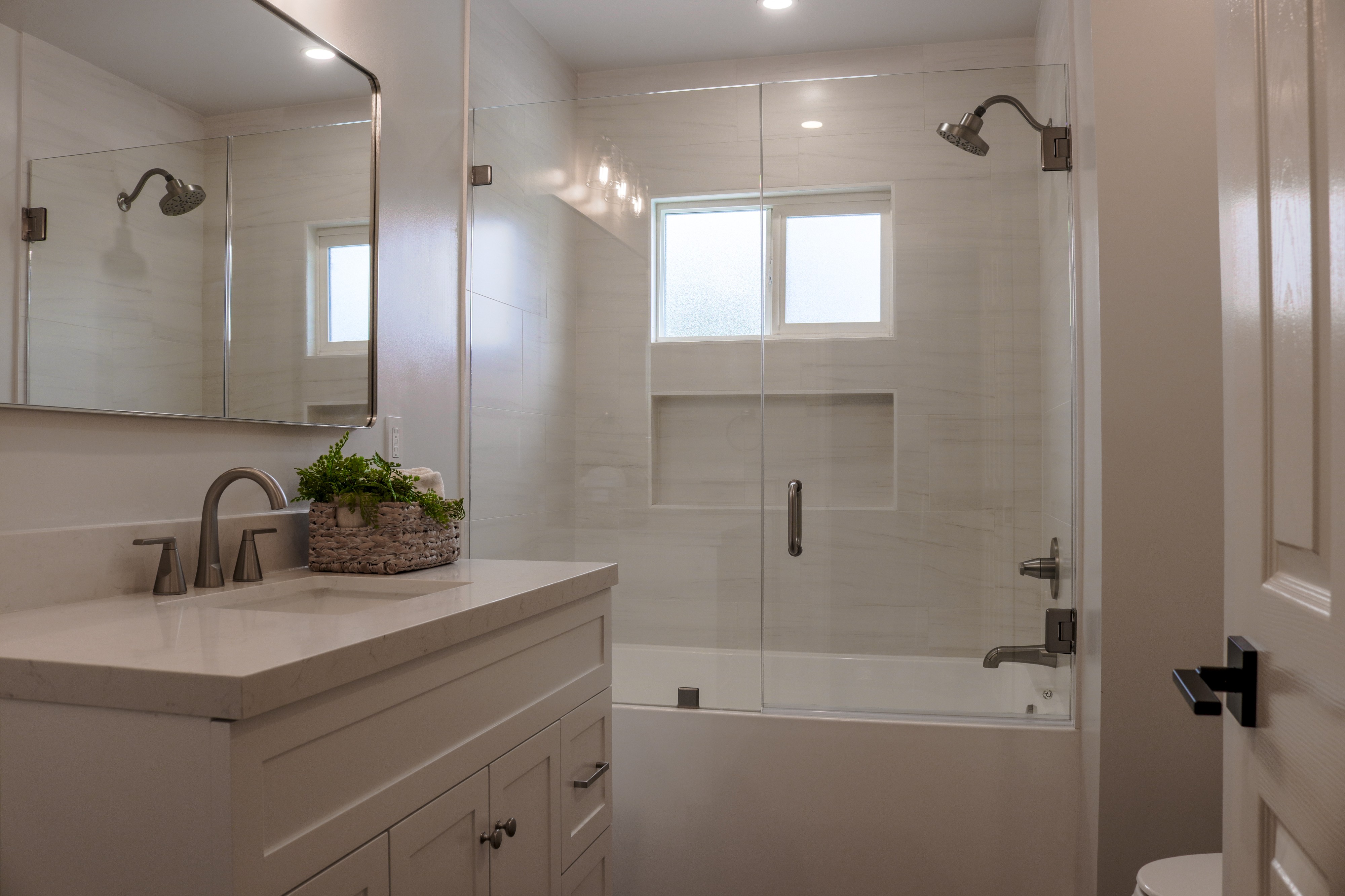 Bathroom with subway-tiled shower-tub and vanity, Tustin residential listing