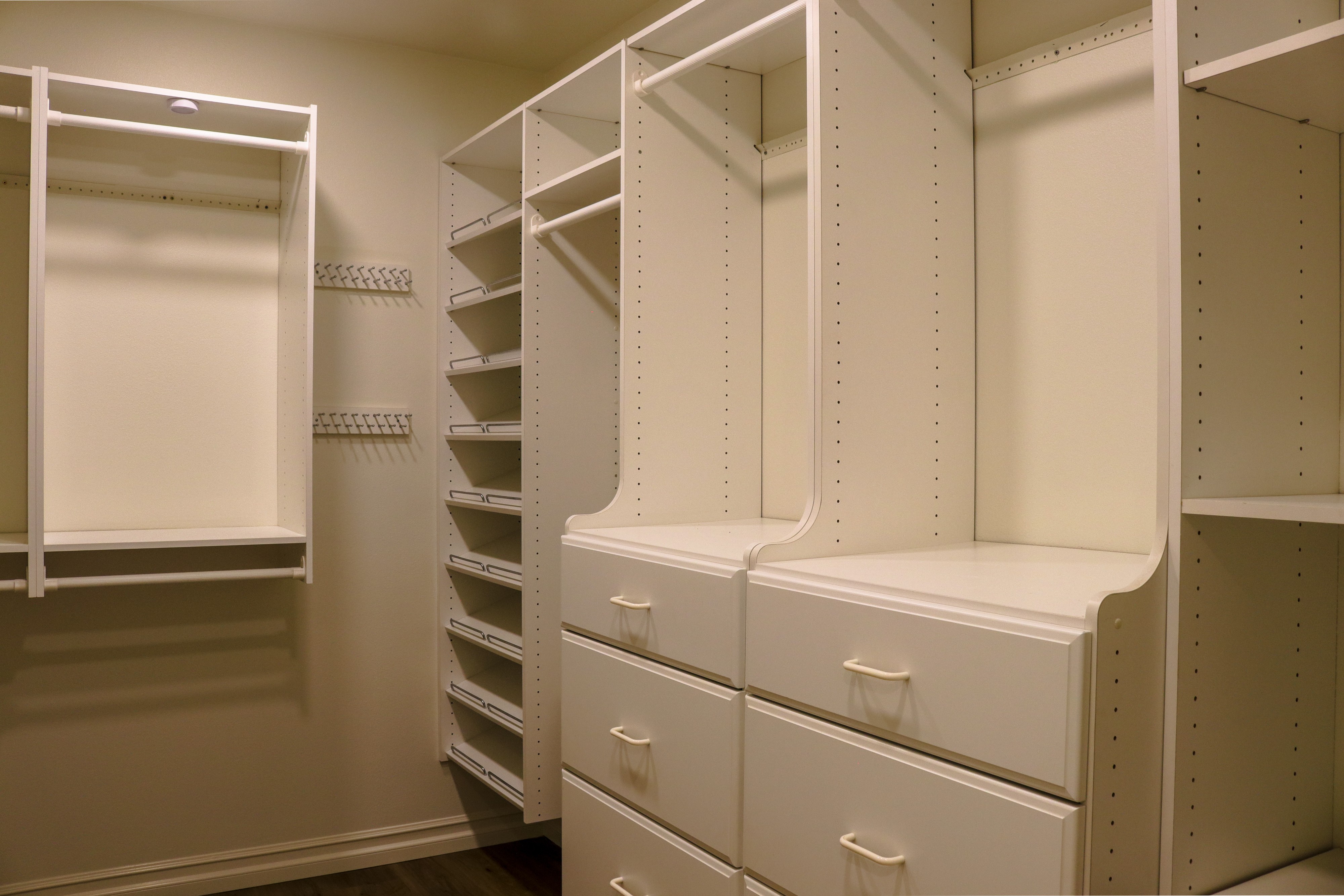 Walk-in closet with built-in shelving and drawer tower, Tustin home for sale