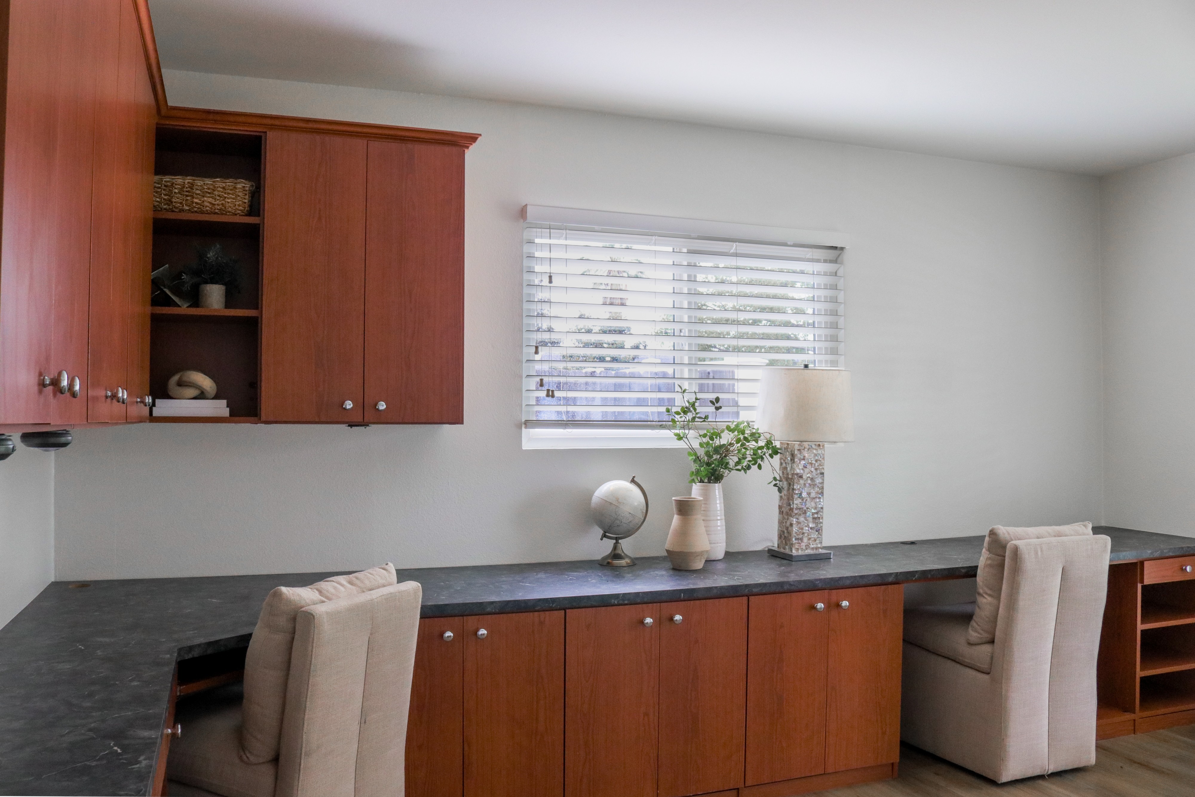 Laundry room with wood cabinetry and folding counter, Tustin residential listing