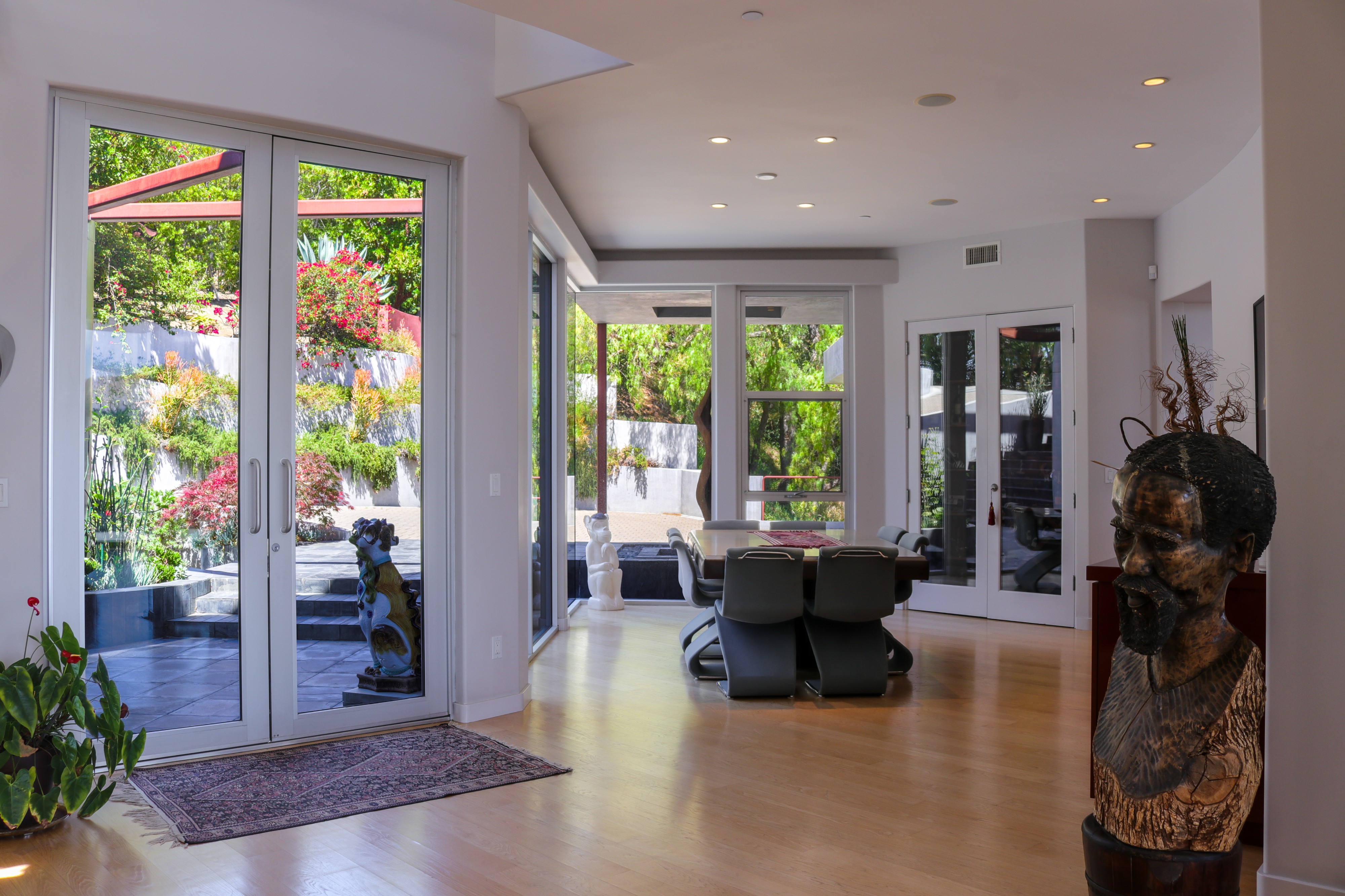 Entry hall with French doors opening to the terrace, Tustin hillside home