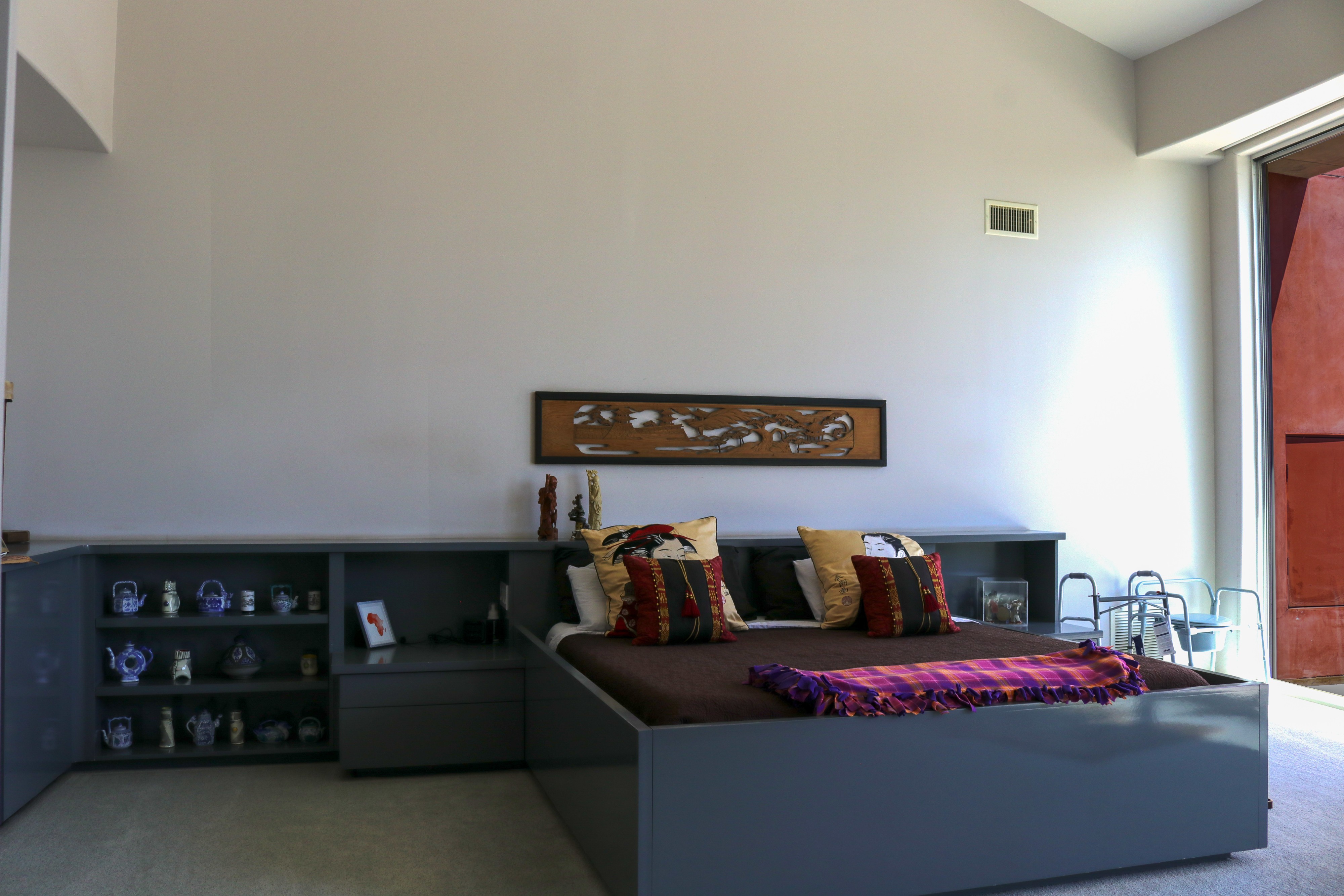 Family room with low sectional and sliding glass doors to the deck, Tustin luxury home