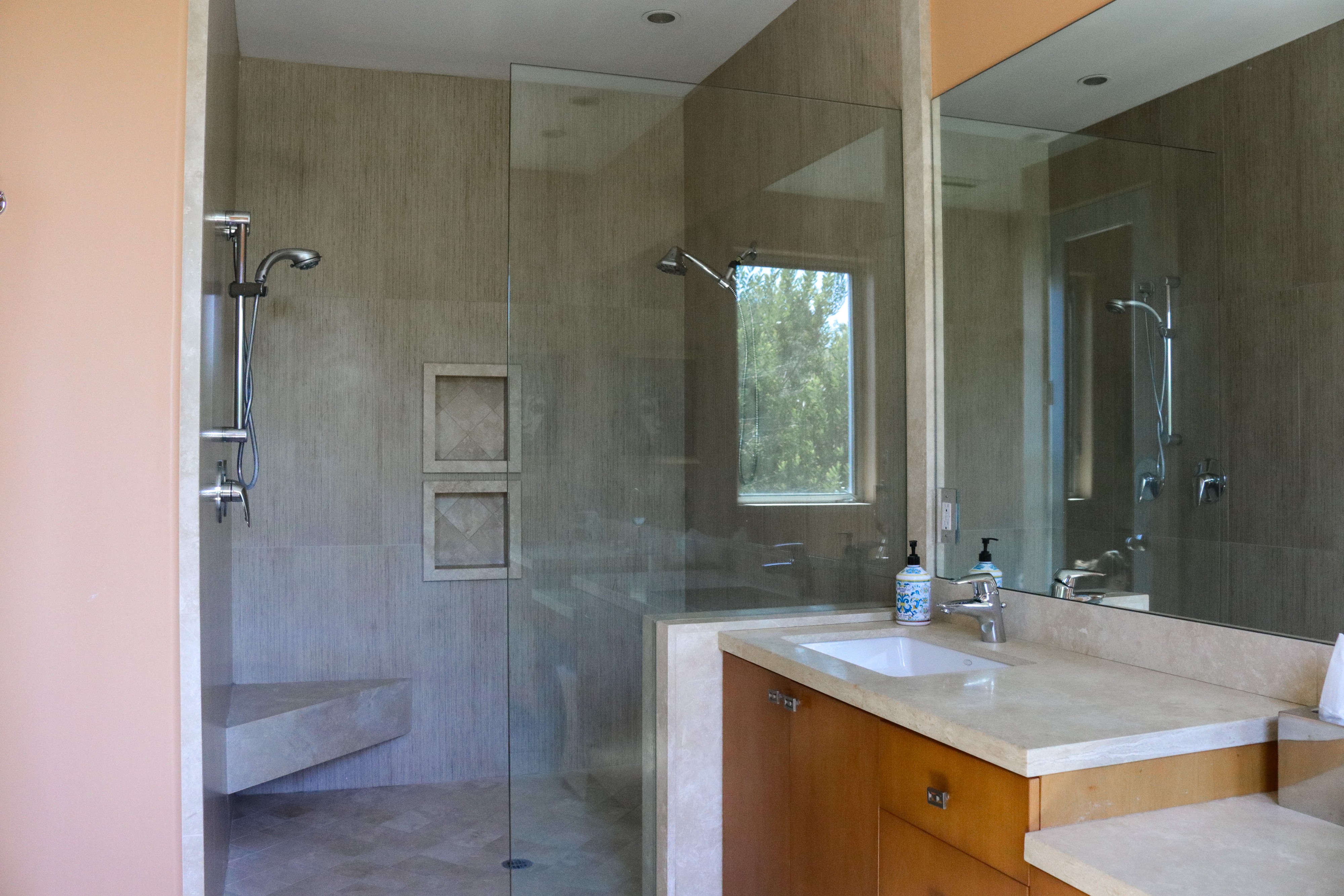 Bathroom with glass walk-in shower and floating vanity, Tustin luxury listing