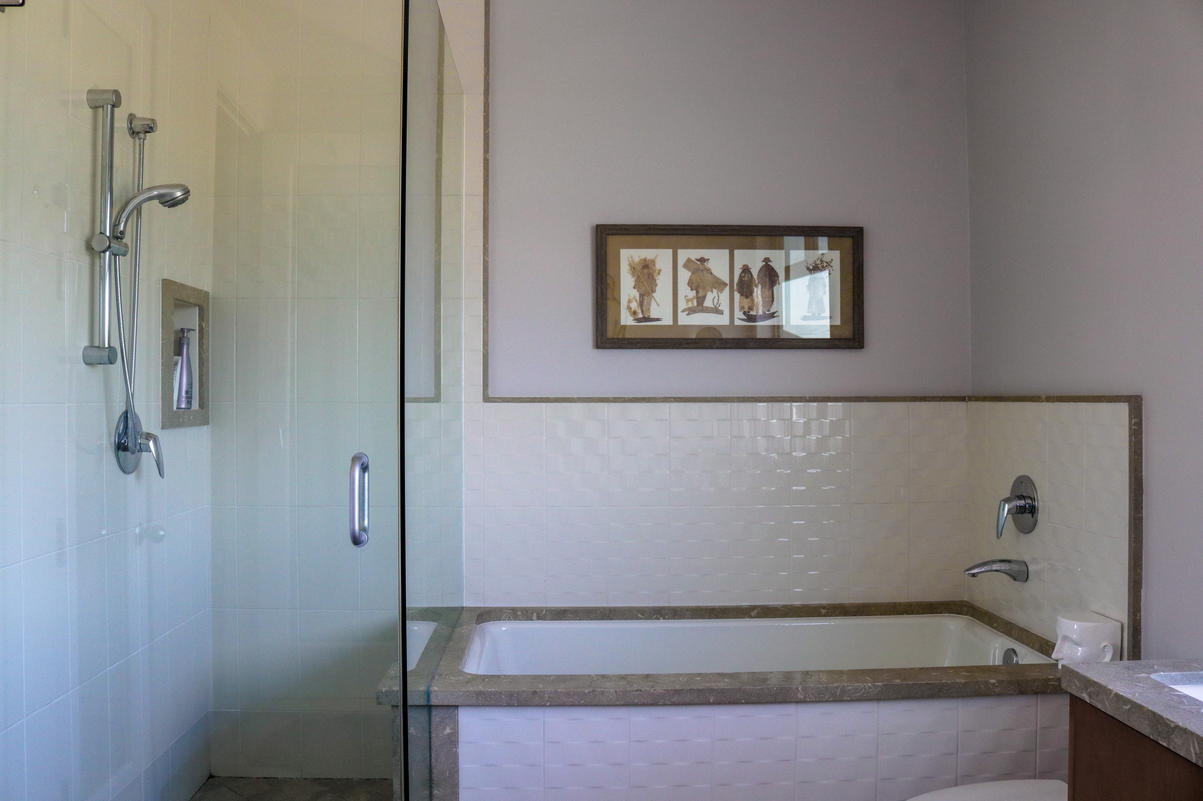 Bathroom with soaking tub and frameless glass shower, Tustin hillside listing