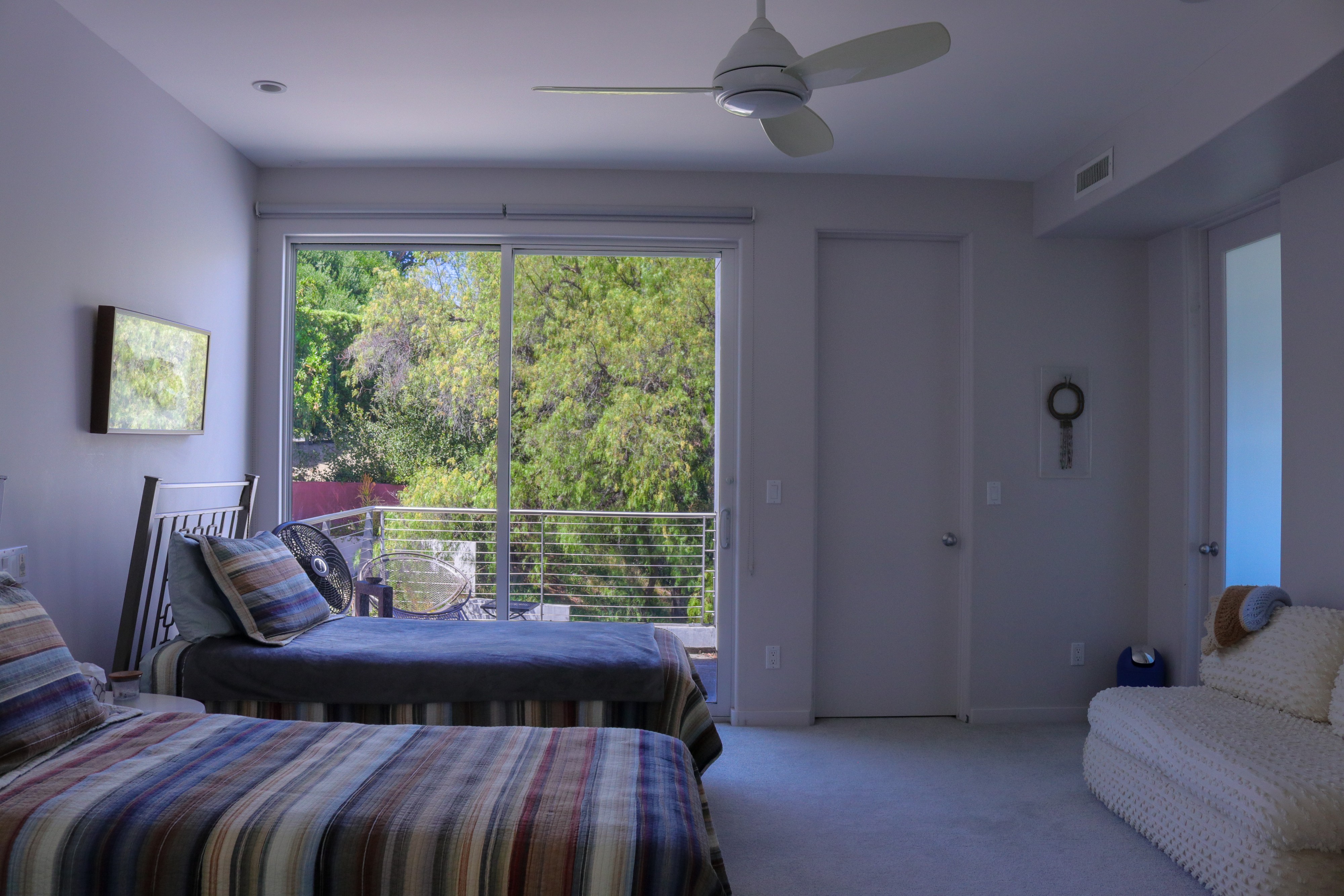 Bedroom with picture window and canyon outlook, Tustin hillside home