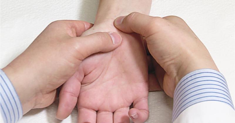 Hand and wrist examination for numbness and tingling caused by possible nerve compression.