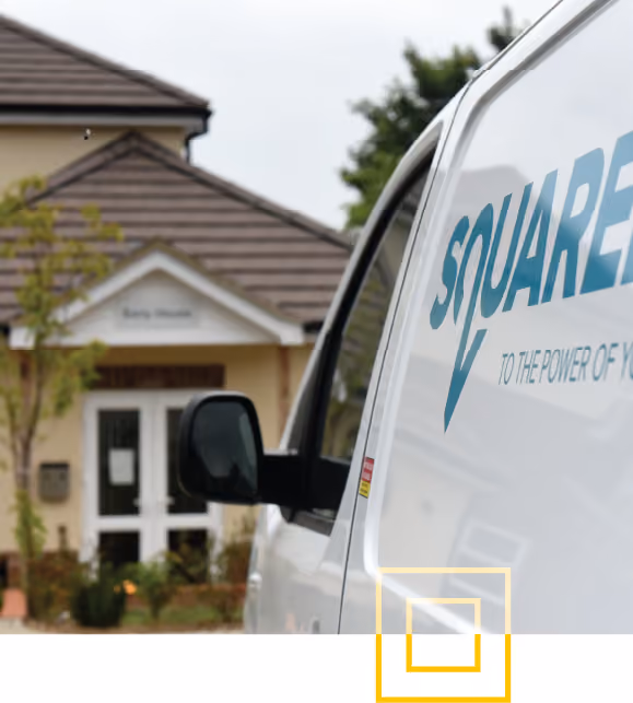 White service van with part of the word 'SQUARE' visible on the side, parked near a residential building with a white front door and a triangular roof.