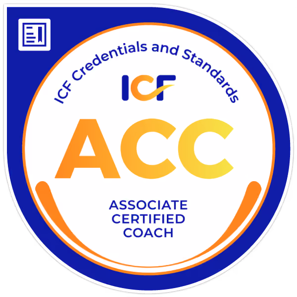 Round badge with blue and orange colors featuring the text ICF Credentials and Standards, ACC in large letters, and Associate Certified Coach underneath.