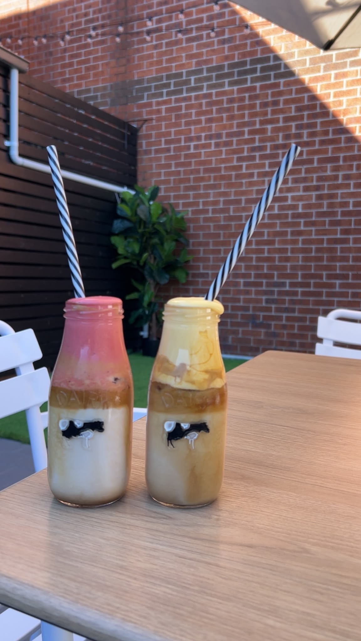 Illustrative image of an iced latte topped with cold foam