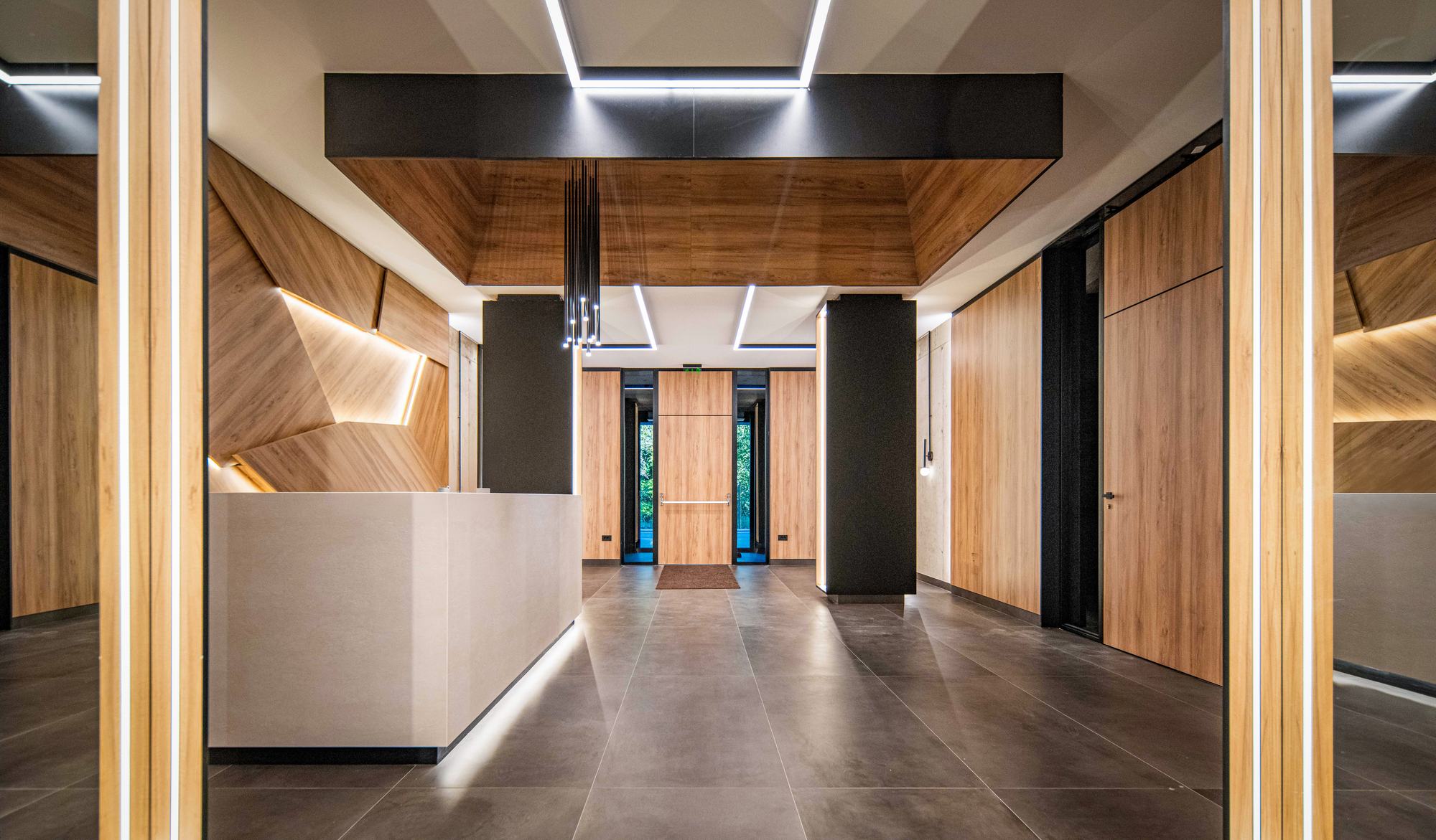 The Royal Residence — the reception counter looking through to the entrance doors