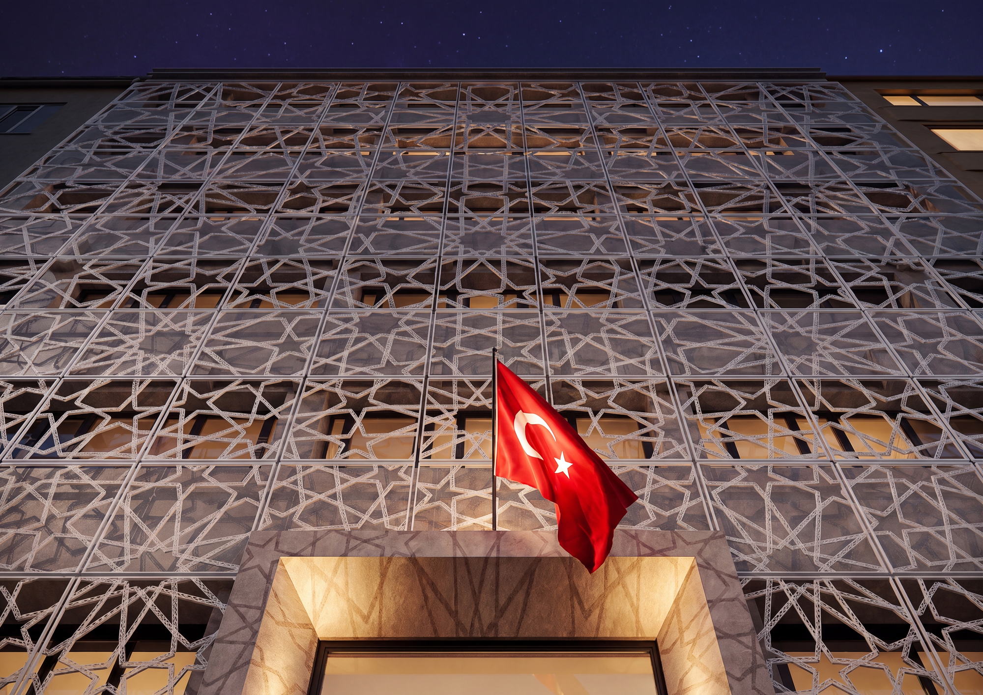 Embassy Turkey — oblique view of the lit screen at night
