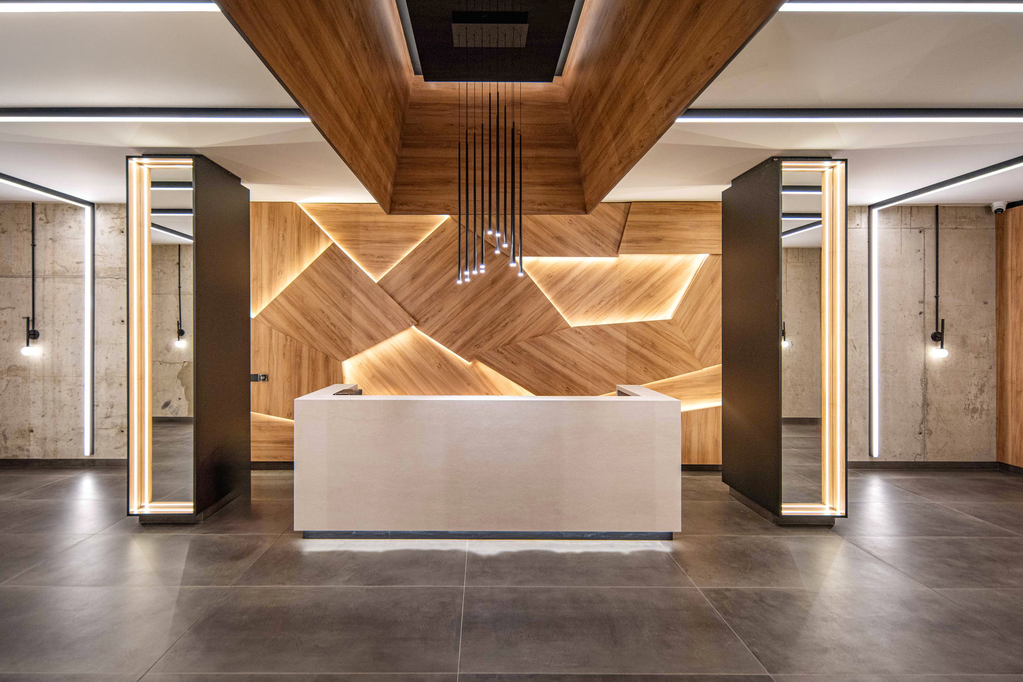 The Royal Residence — reception lobby and chevron timber wall