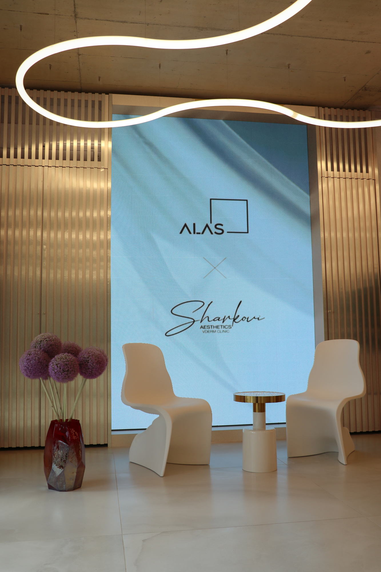 VDERM — waiting chairs beside the fluted panel