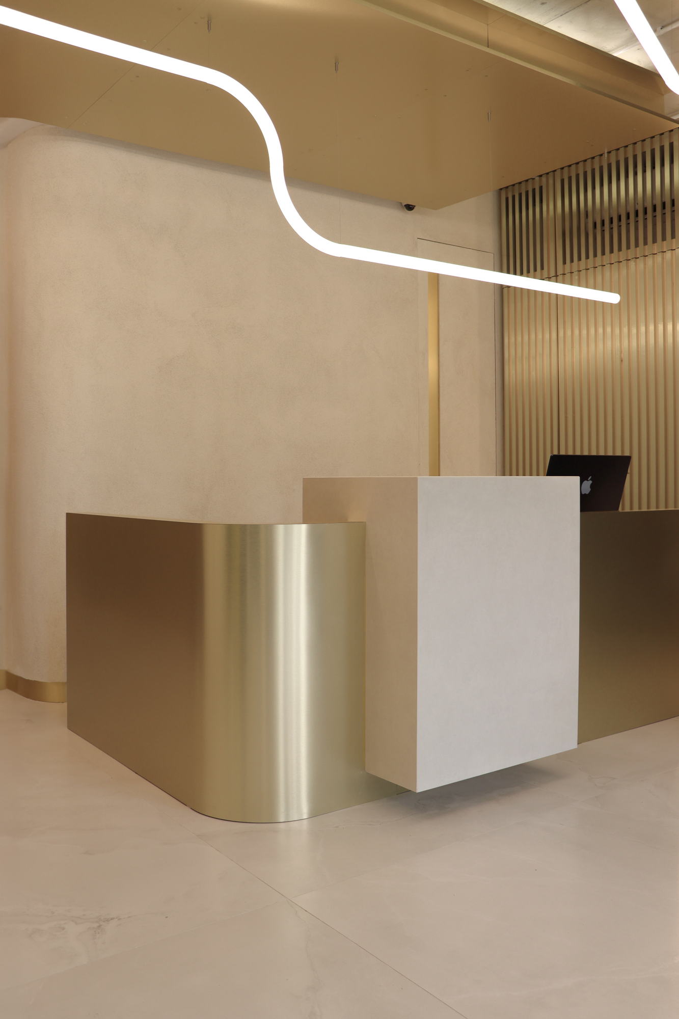 VDERM — brass and stone reception desk
