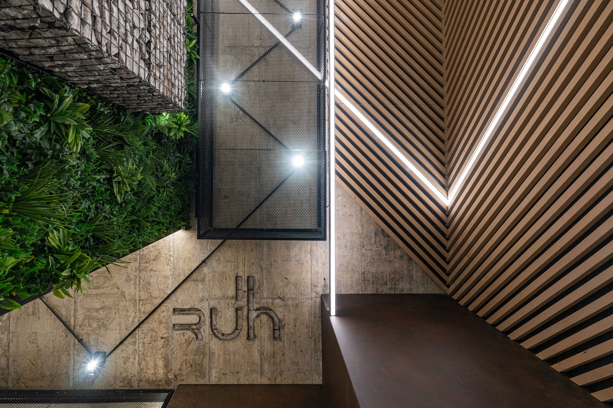 Entrance foyer for RUhouse II, in stone, moss and oak.