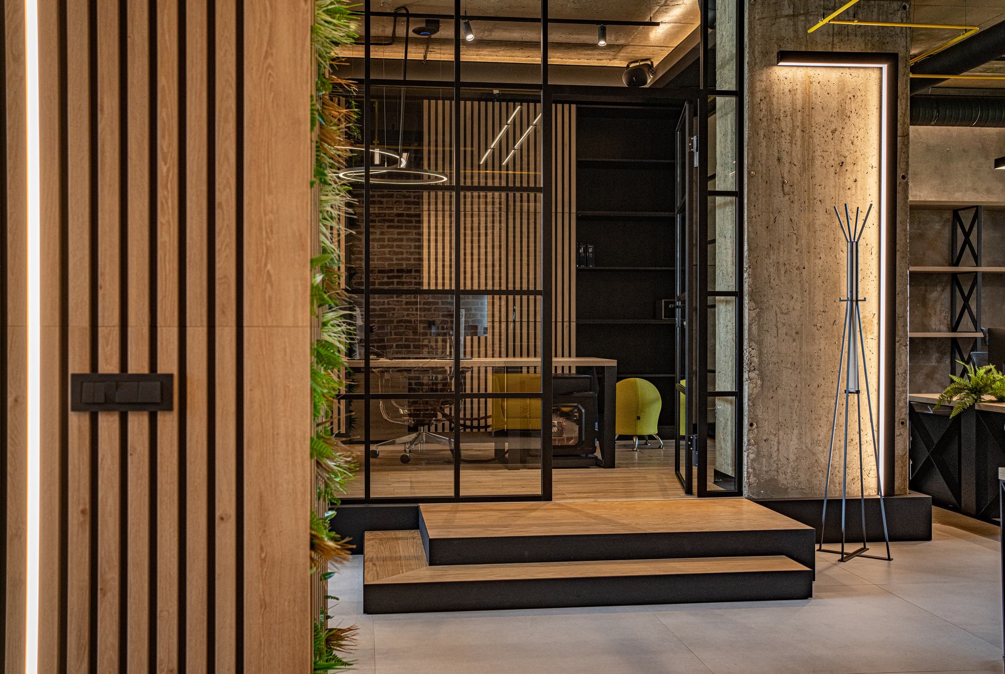 Comfort Partners Headquarters — timber slat wall and the steps up to the meeting room