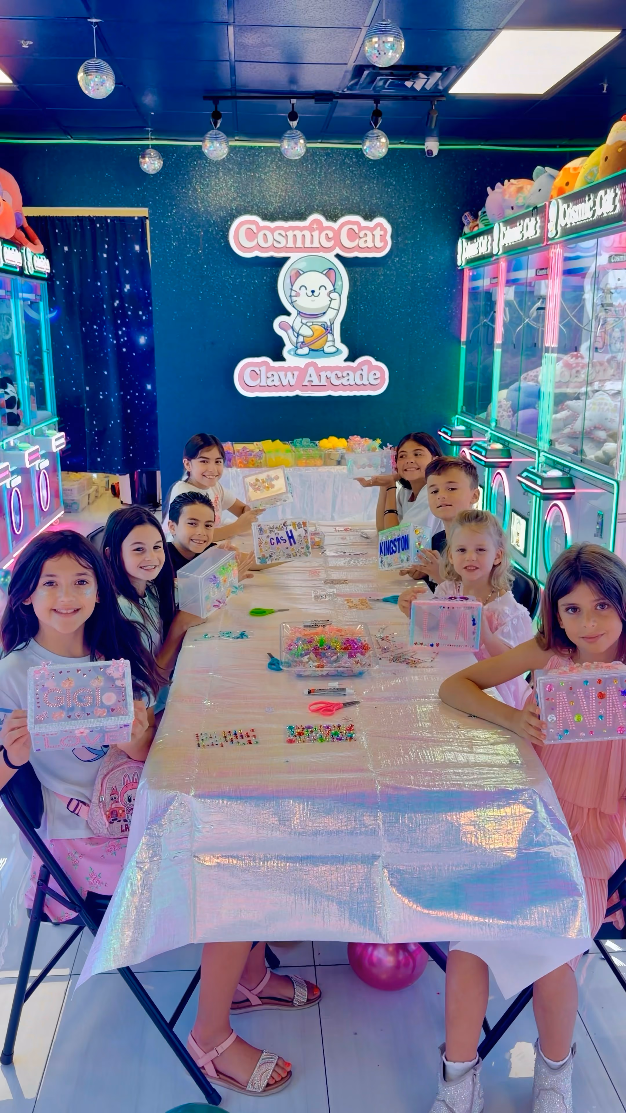 A long table of children at a Squishy Bar session