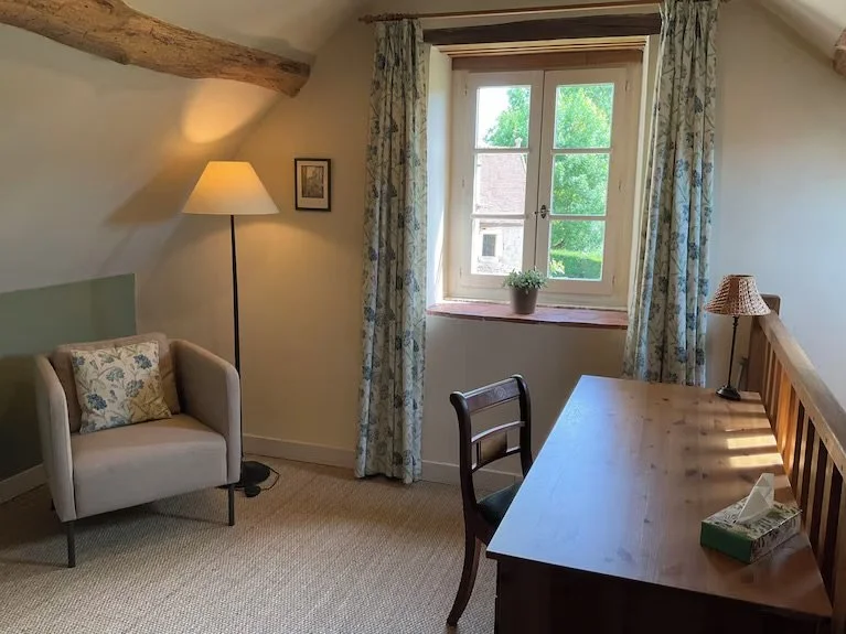   I used this landing as a dressing room but it does have a daybed. I loved the desk and the light in the morning. You have a view of the backyard and church from here. Note that some reviews in the summer months mention that the upstairs can be warm. In February, when the temps still dipped down into upper 30’s and low 40’s at night, it was nice and cool for me to sleep.   