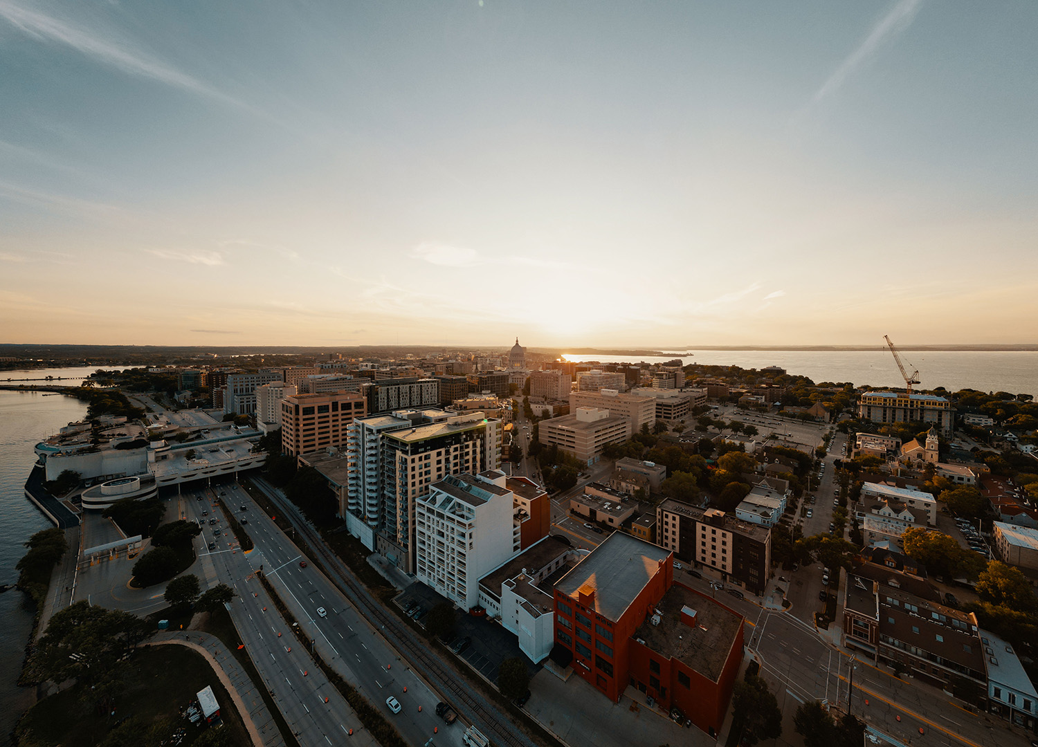 Aerial view of downtown Madison, Wisconsin skyline at sunset near Lake Monona