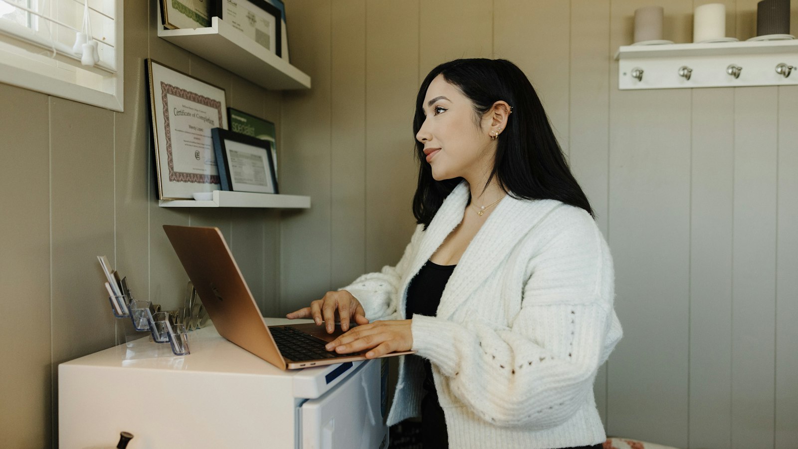 Small business owner working at a laptop