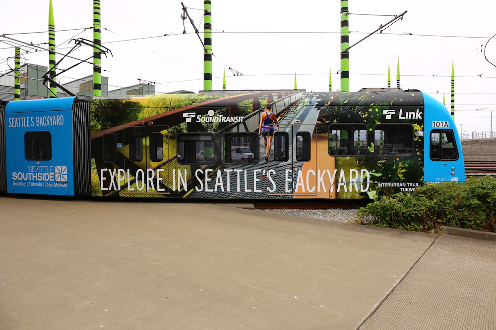  Seattle Southside ad shown wrapped on a commuter train