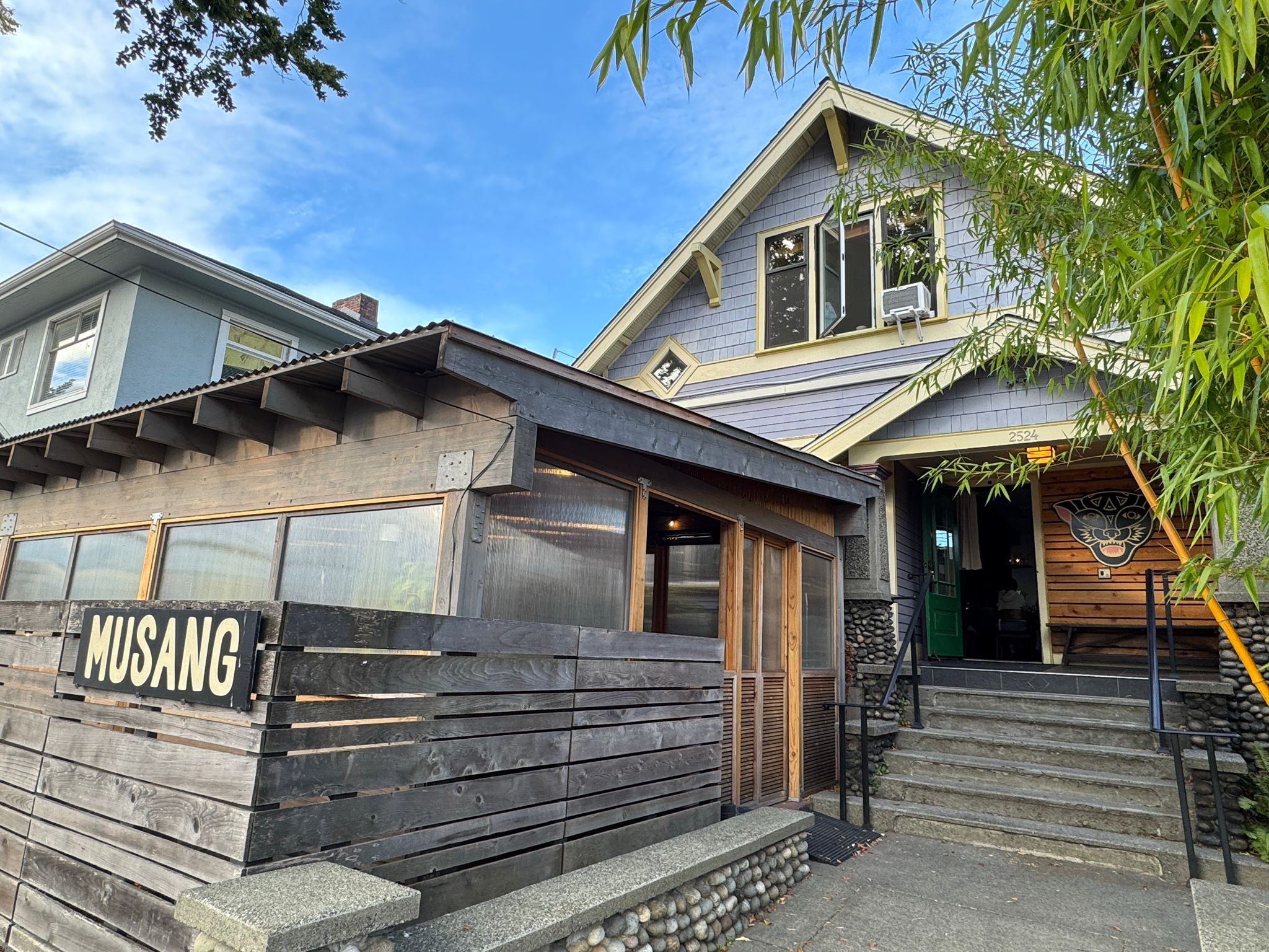 Exterior of Musang, Seattle, with the MUSANG sign