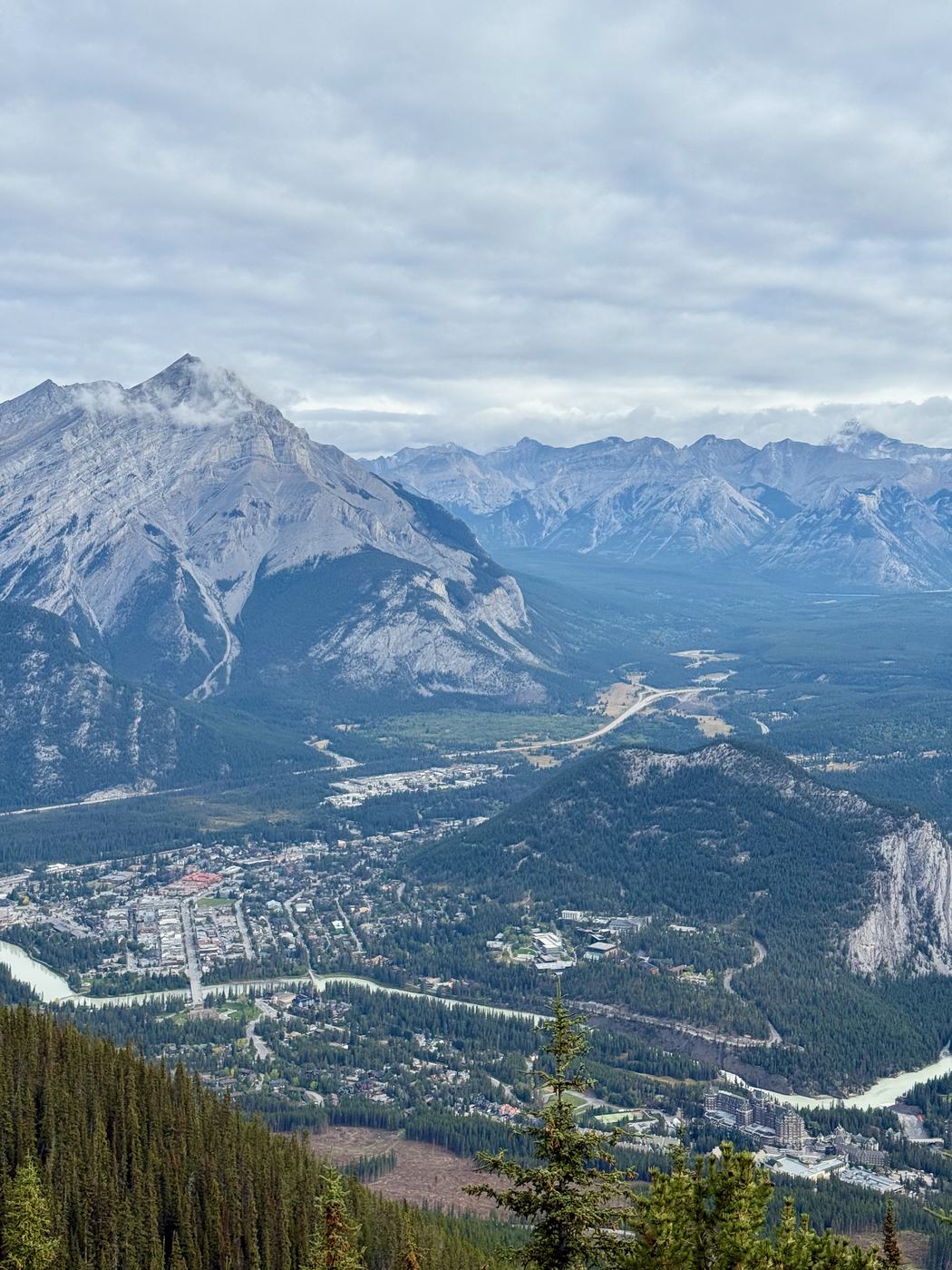 The town of Banff seen from the top of Sulphur Mountain, with Cascade Mountain, Tunnel Mountain and the hotel below