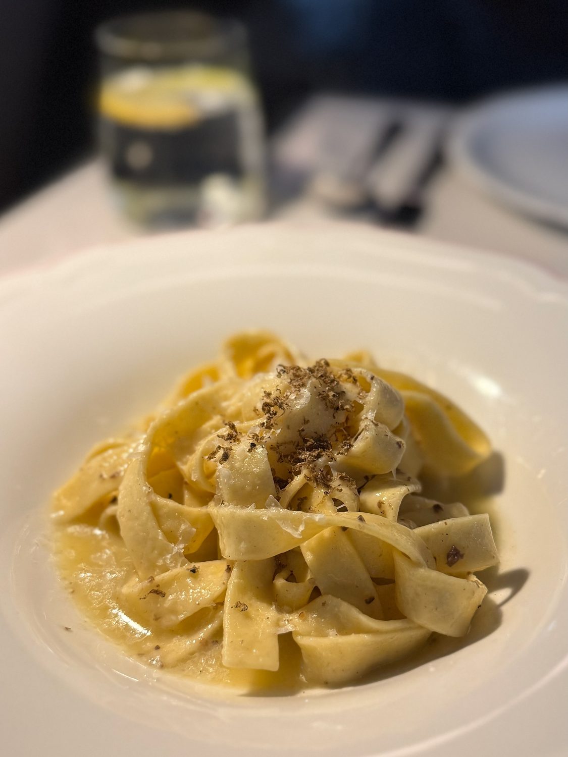 Tagliatelle in pecorino romano and cracked black pepper, finished with shaved truffle