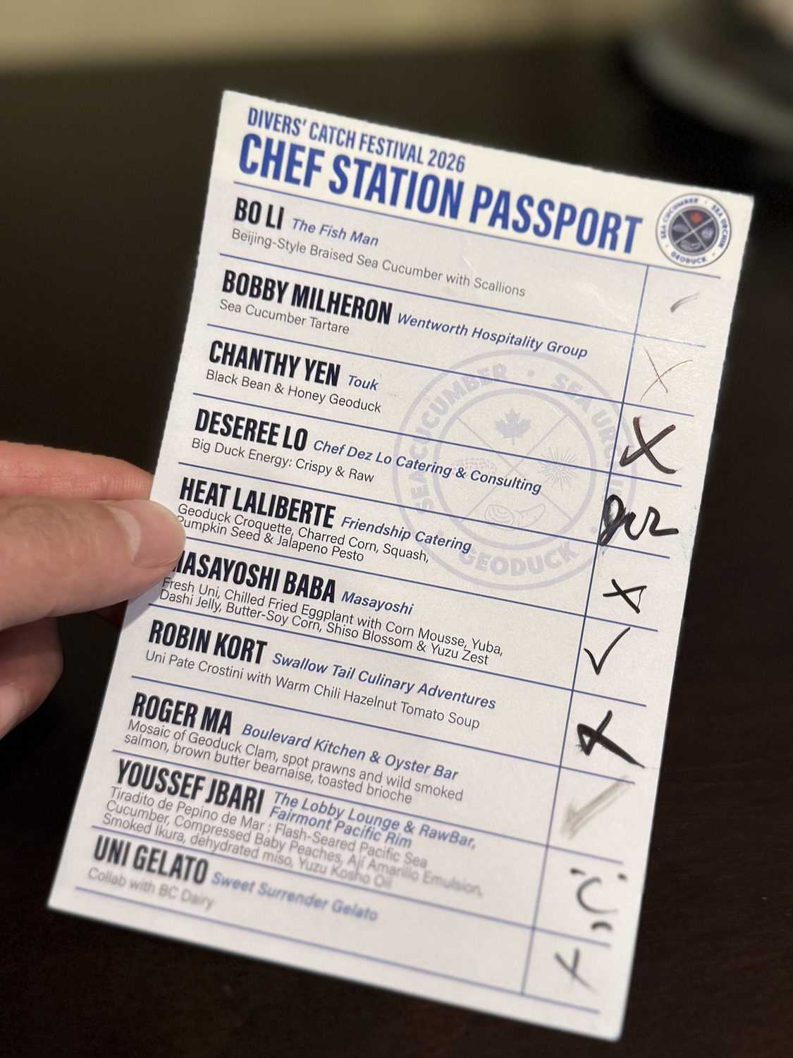 The festival’s chef station passport listing ten stations, every row marked