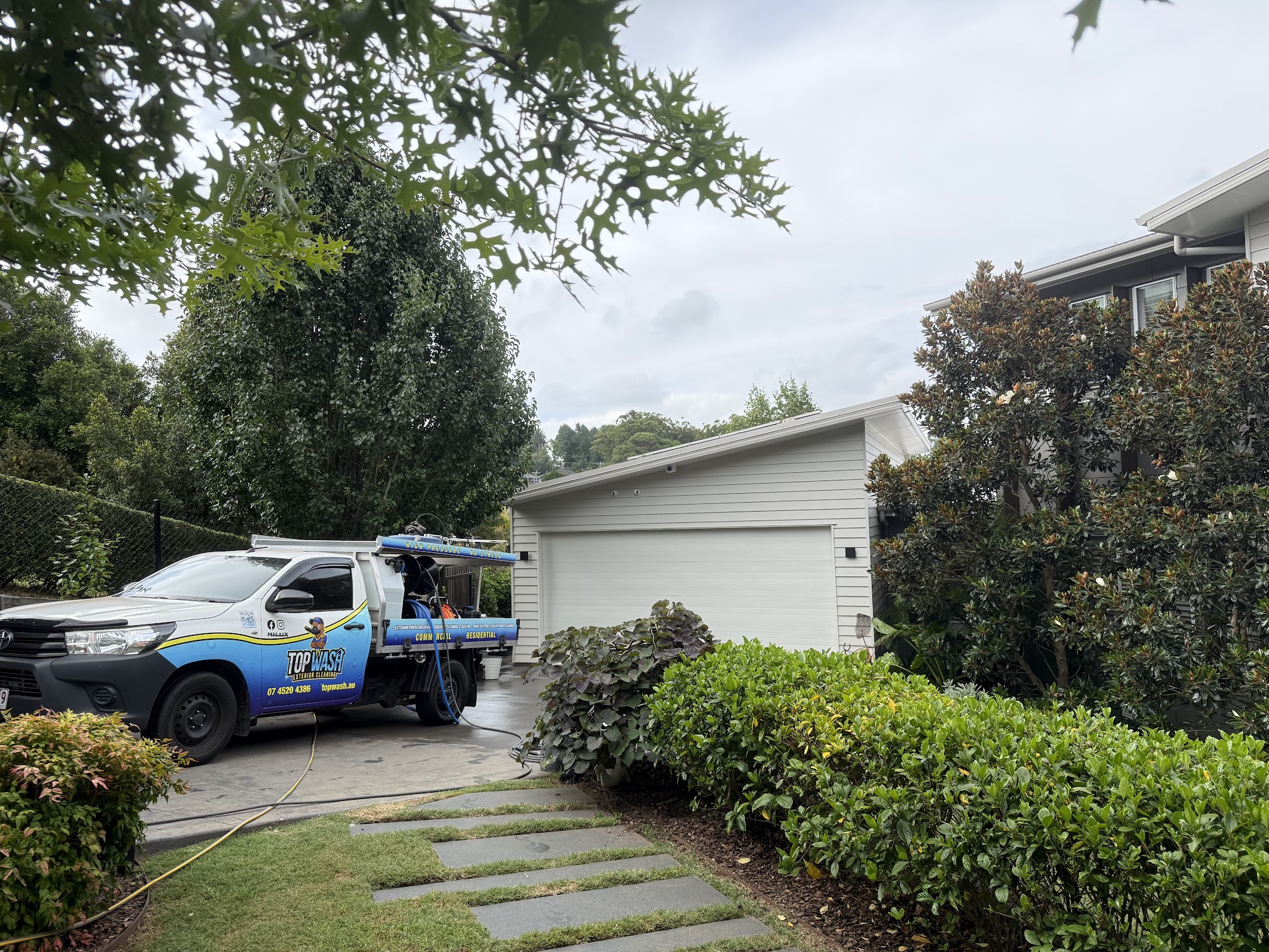 TopWash ute and rig on site at a Toowoomba home with the garage door cleaned