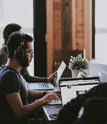 Two professionals working together in a modern office setting