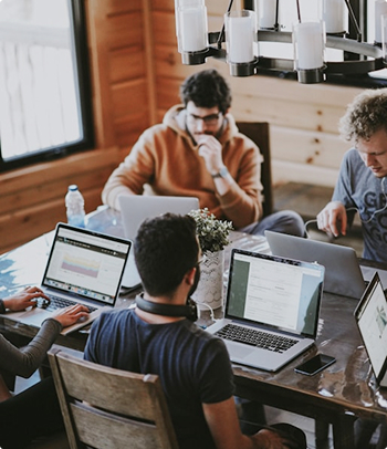 Professionals working together in a shared workspace