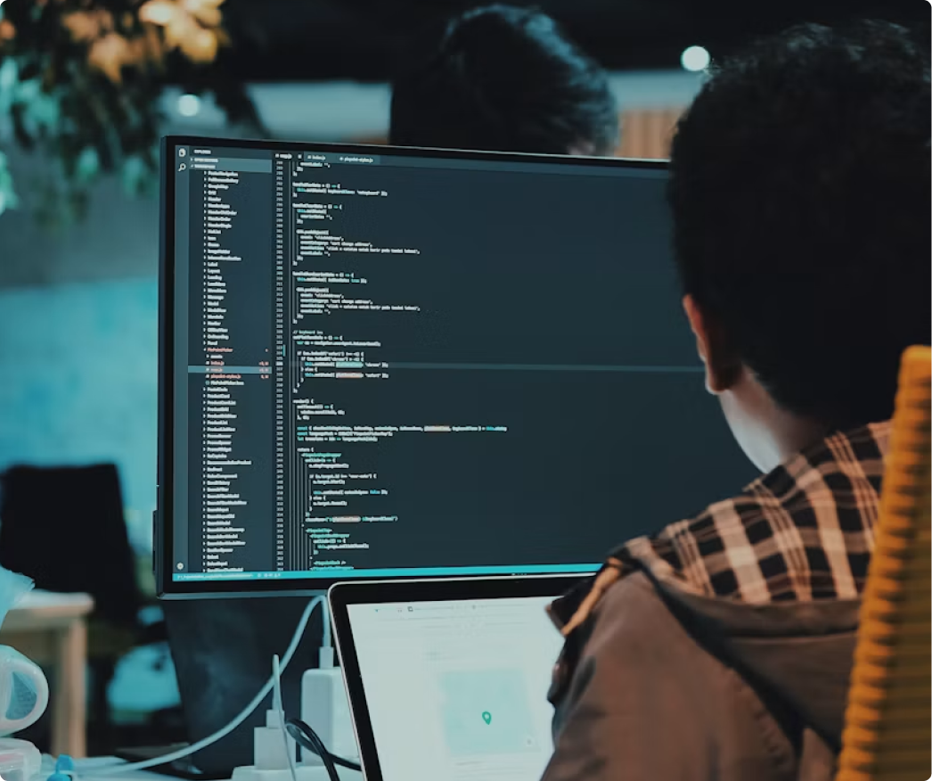 Engineer working on a laptop in a professional workspace