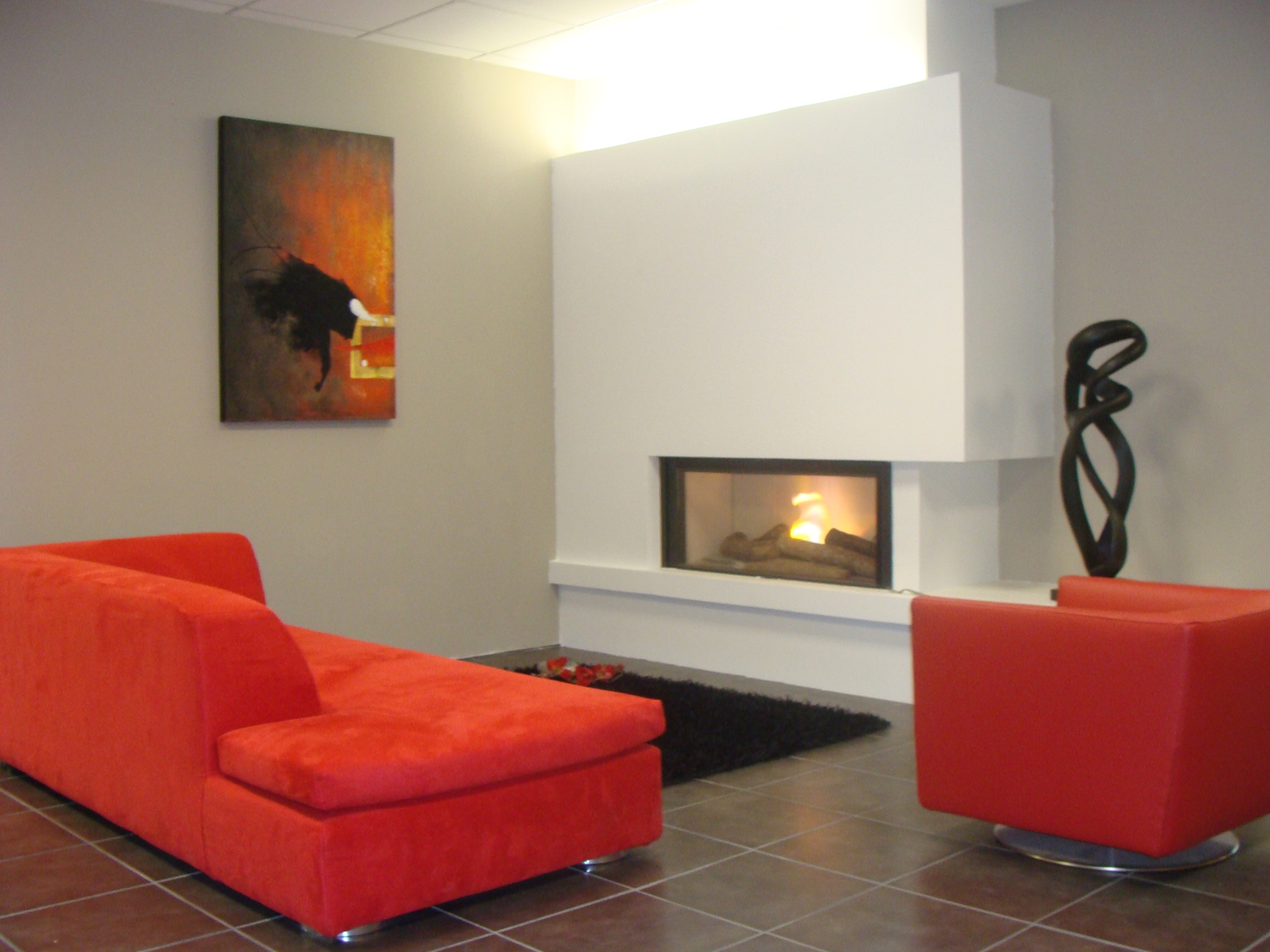 Installation d'une cheminée Spartherm d'angle chez un client