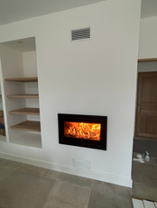 Installation d'un insert à bois Spartherm chez un client